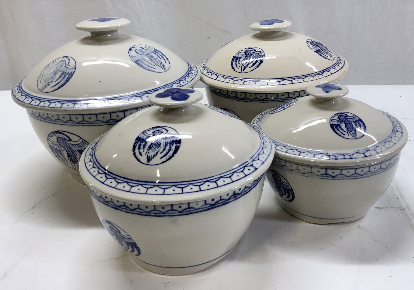 Set 4 Chinese Blue Heron Lidded Bowls: Set 4 vintage Chinese stoneware rice bowls with lids. Cobalt blue heron decor. 4 sizes. Largest size measures 7.5 in. Ht x 8.25 in. bowl diameter. Bowl depth is 4.75 in. approx. One lid with glaze cra