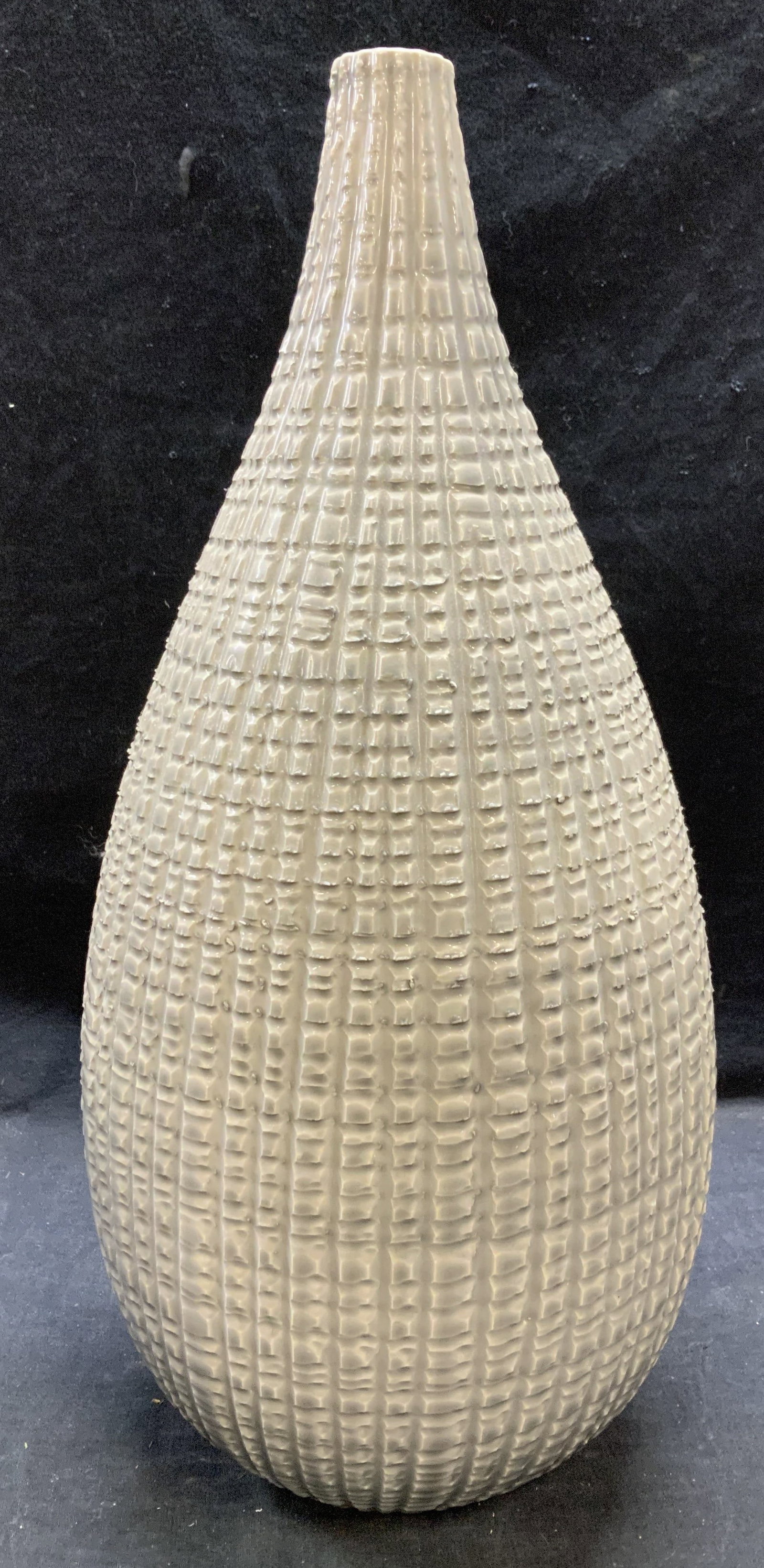 Crate & Barrel Gray Ceramic Textured Vase: Crate and Barrel gray ceramic vase with geometric textured surface. Trademarked to underside. Made in Portugal. Measures approx. 8 x 19 inches. Some surface wear including scratching observed. Crate a