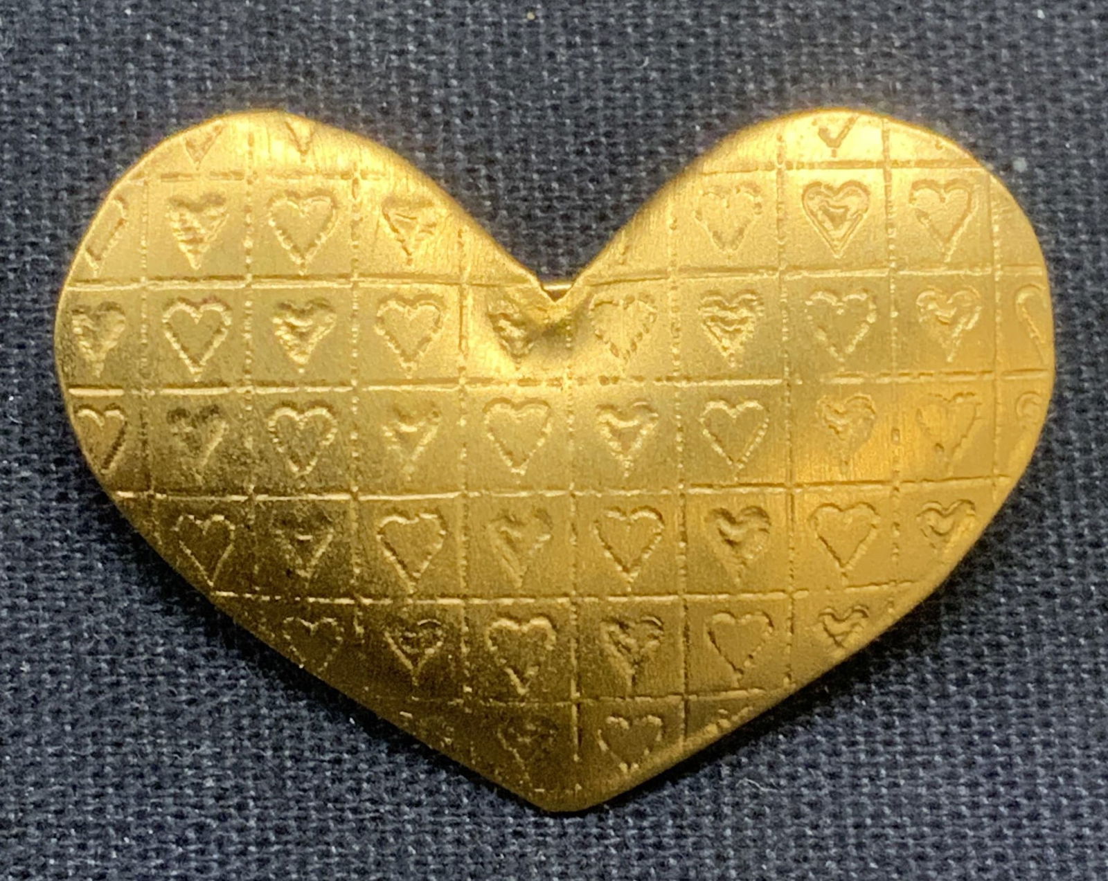 Signed Sterling Silver 24k Gold Pl Heart Brooch: Signed sterling silver and 24k gold plated heart brooch with embossed heart pattern. Marked sterling/24k. Signed illegibly. Hinge pin to underside. Measures approx. 1 x 1.25 inches. Total weight .14 o