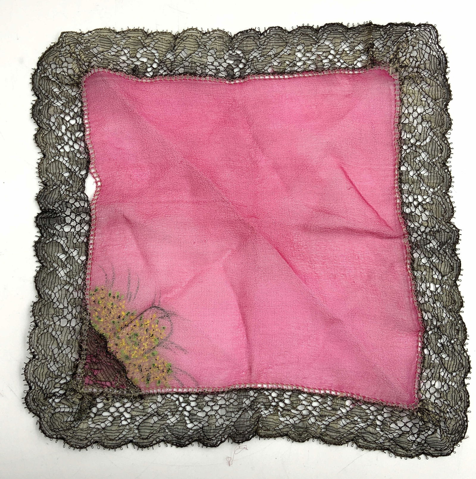 Vtg Hand Painted Lace Linen Handkerchief: Vintage linen handkerchief with black lace edge and center in a magenta tone. Hand painted flowers on one corner. Approx 8 x 8 inches. Moderate wearing to black lace. Lace and linen handkerchief, hand