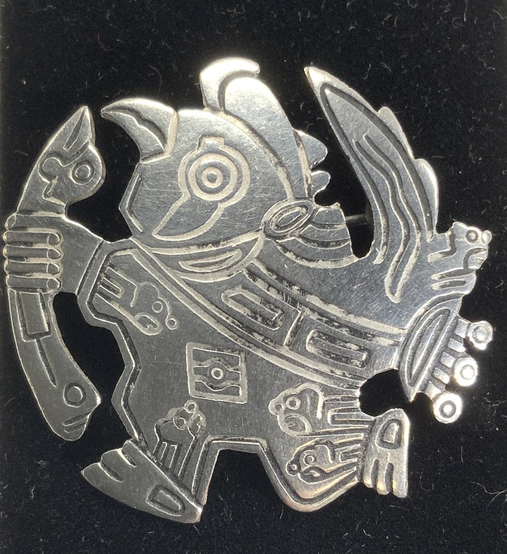 Sterling Silver Mesoamerican Figural Brooch: 1.5 x 1.25 in sterling silver brooch, hand crafted. Aztec figural. Marked 925. .19 ozt Brooch, sterling silver Mesoamerican brooch, .925 jewelry, handmade sterling silver brooch, Aztec figural sterlin