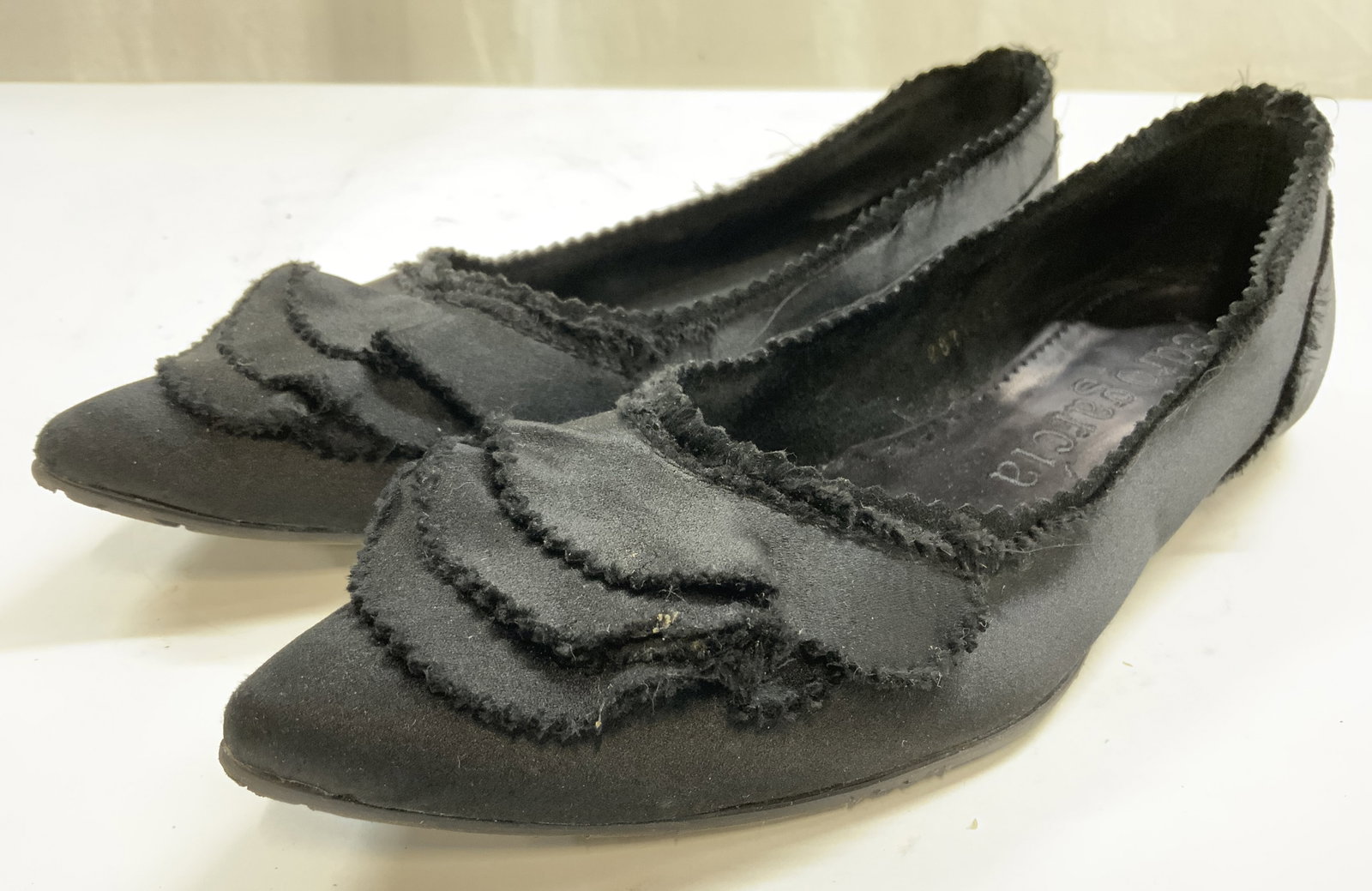 PEDRO GARCIA Pr Silk Frayed Flats 40.5 Black: Insole reads PEDRO GARCIA. Flats are black toned with silk exterior & fraying. Shoes are size 40.5. Undersides are inscribed PEDRO GARCIA. Each shoe measures approximately 11.25 inches long 3.25 inche