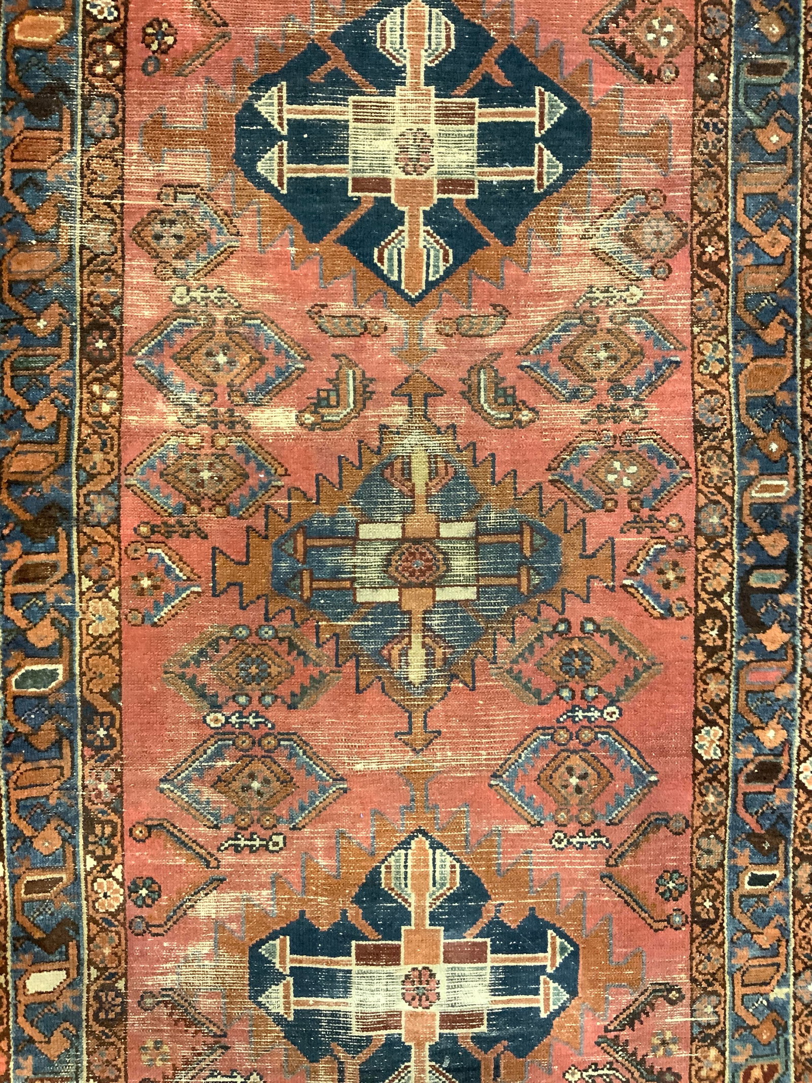 Antique Handmade Persian Wool Rug: Rug is handmade and wool. Piece appears to be antique possibly vintage. Rug has intricate multi toned floral motif detail. Measures approx 66 inches long 39 inches wide. Rug, Persian rug, handmade rug