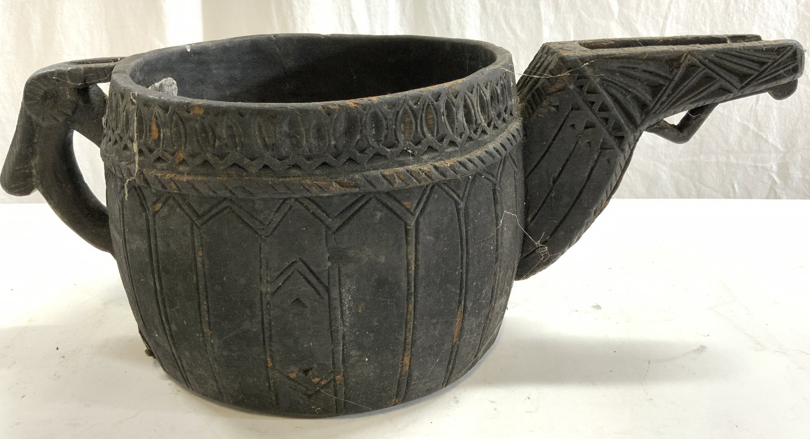 Vintage Wood Opium Kharal Bowl Vessel Black: Bowl, is black toned and wooden, piece appears to be vintage. Appears to be from Bhutan. Vessel has geometric relief patterns & detail. Piece measures approximately 17.5 inches deep 9 inches wide 6.5 