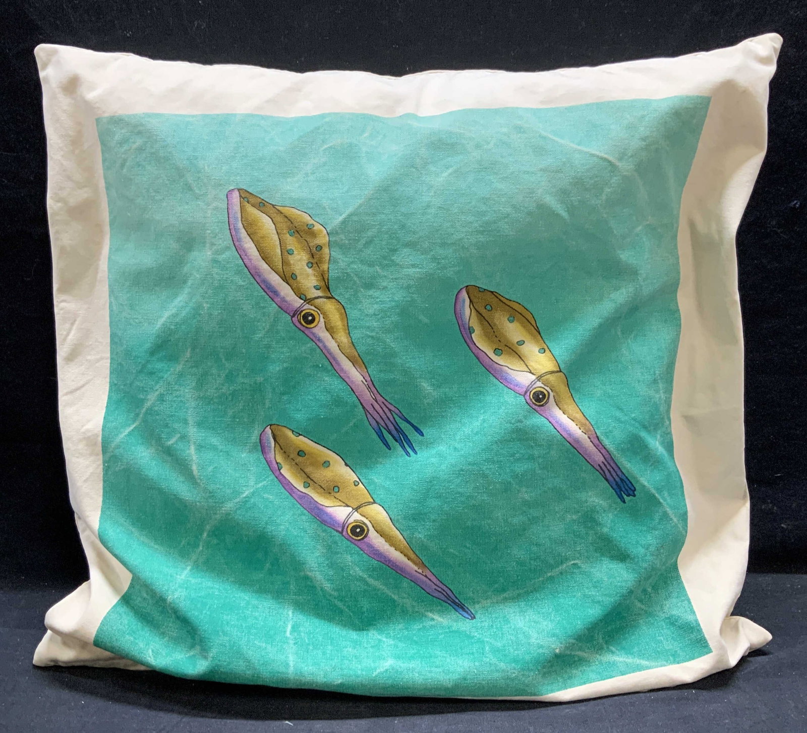 Helio Graphics Squid Cotton Pillow: Helio Graphics squid print cotton pillow. Measures approx. 20 x 19.5 inches. Some wear to material and small blemishes consistent with exposure. Helio graphics, Helio graphics pillow, squid pillow, co
