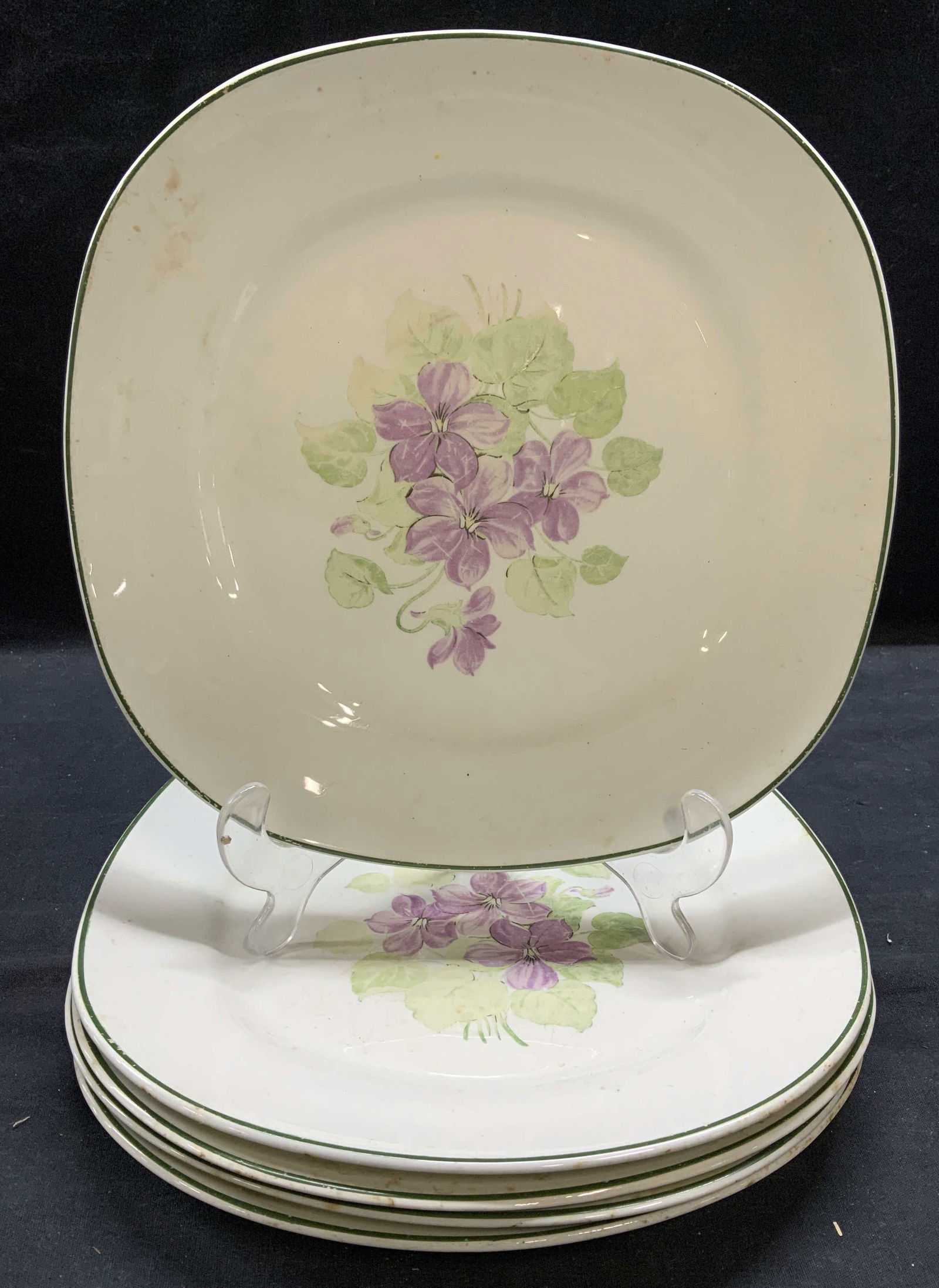Set 5 Taylor Smith Taylor Conversation Plates: Set of 5 vintage Taylor Smith Taylor Conversation ceramic dinner plates designer by Walter Teague. Hand painted floral motif in green and purple. Trademarked to undersides. Measure approx. 10 inches w