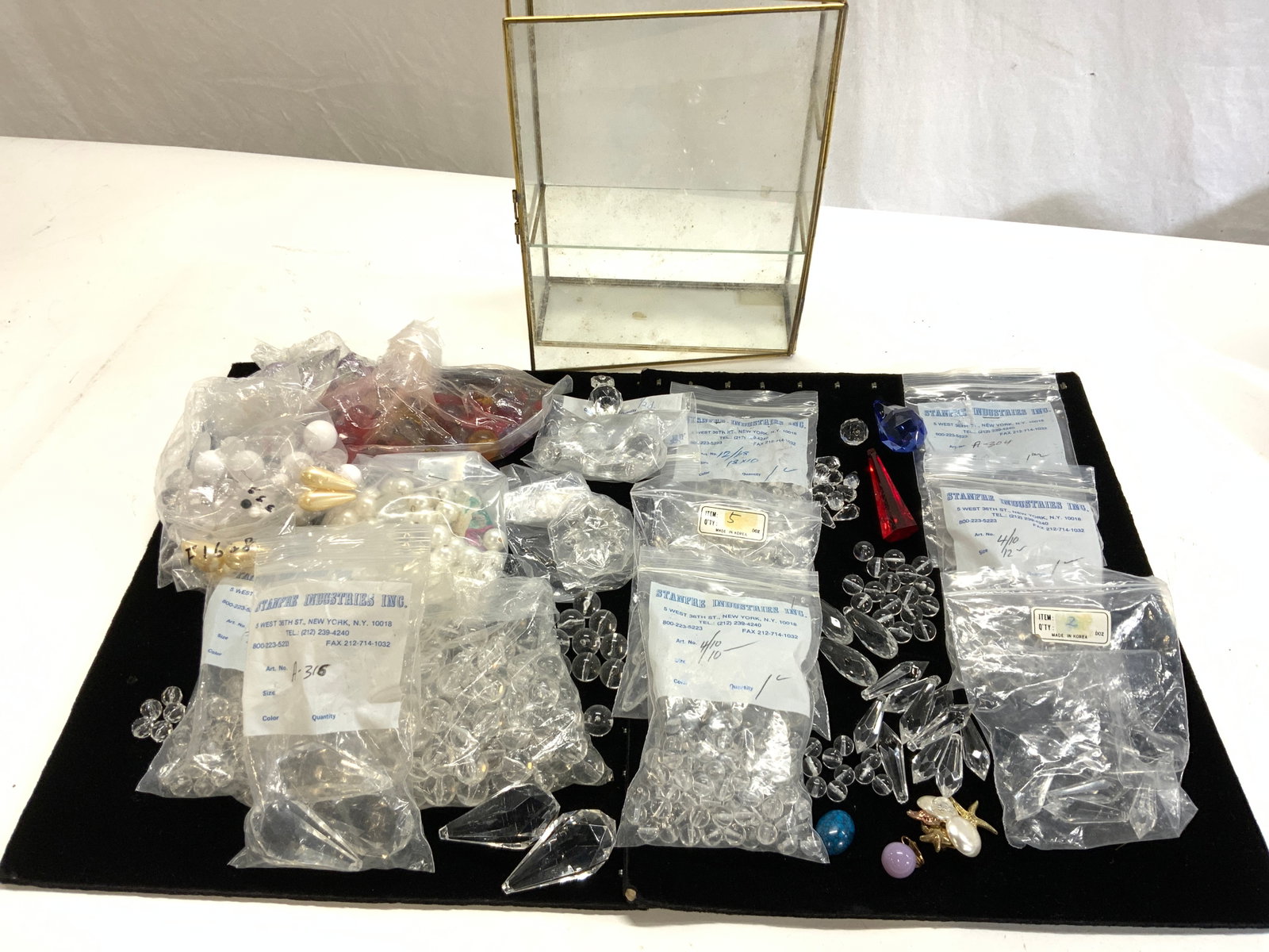Jewelry Beads/Chandelier Prisms New in Bag: New bags of faceted and spherical prisms, faux pearl beads and colored prism and ball beads. For use as lamp/ chandelier prisms or jewelry making. Various sizes and shapes and quantity. 3 Long red and