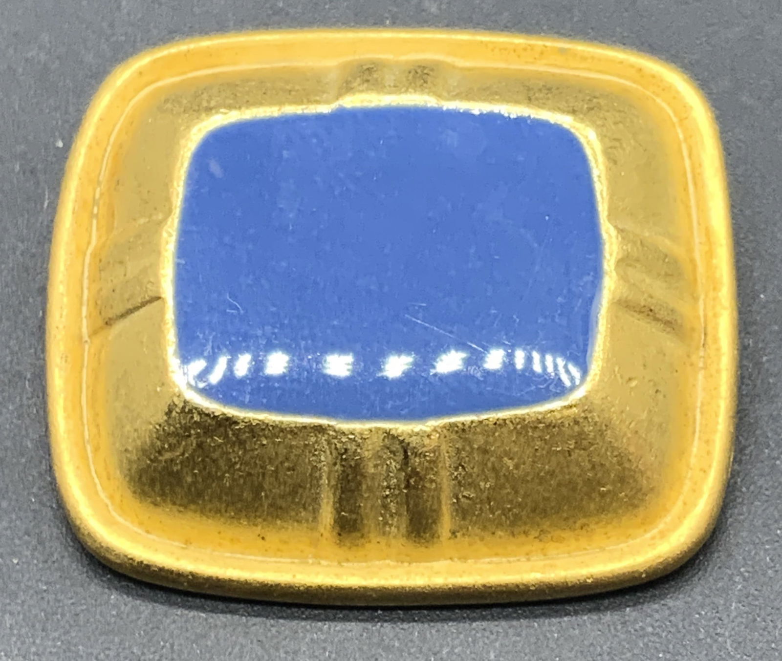 BANNER USA Vintage Blue Enamel Jewelry Pendant: A vintage gold tone metal jewelry pendant with blue hued enamel work to the center. Reverse marked BANNER USA. Measures approx. 1Wx 1.25L in. Some wear consistent with age, use, and exposure. Vintage