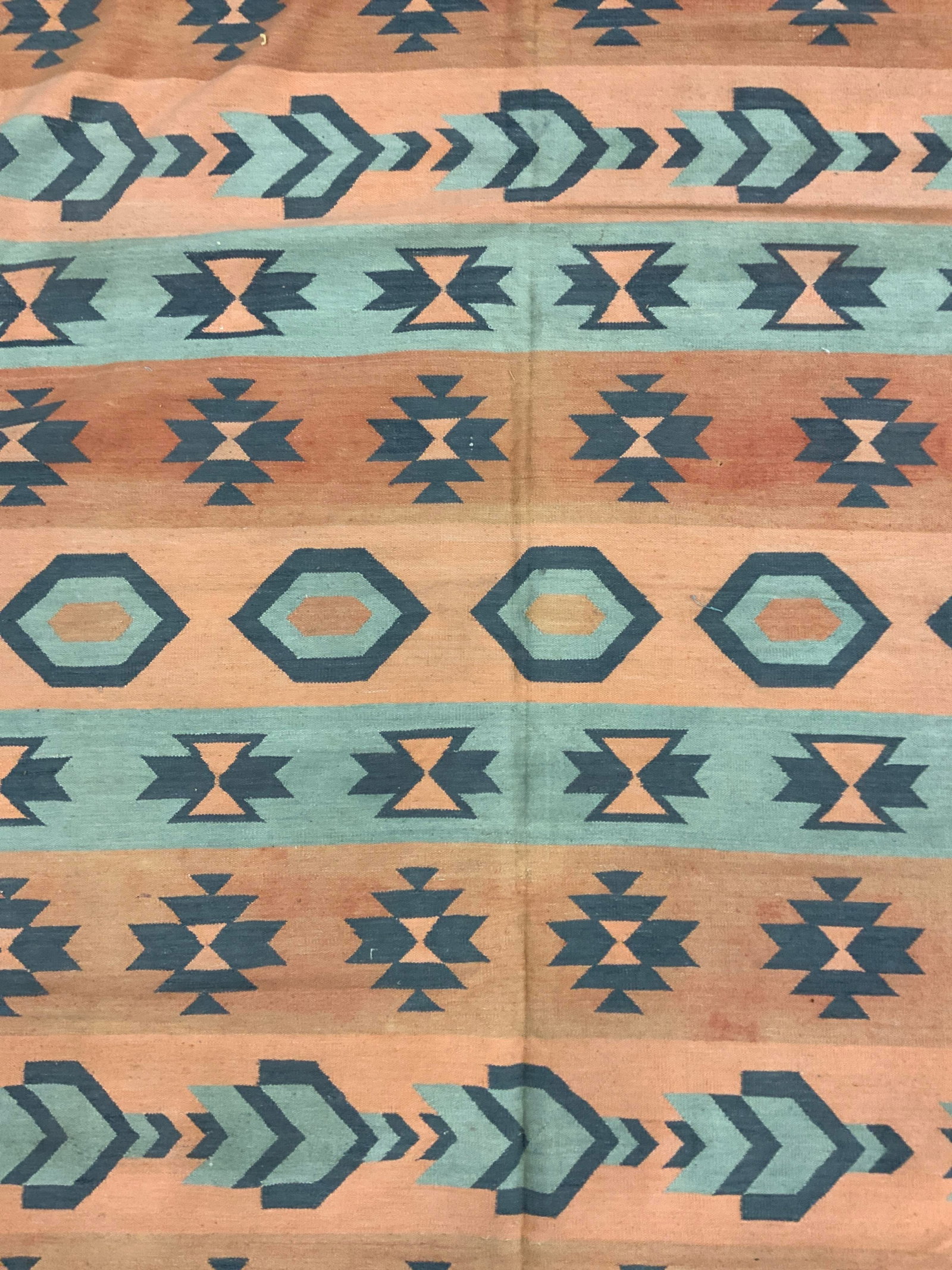 Vintage Handmade Kilim Fringed Wool Rug: Rug is handmade and wool. Piece has intricate multi toned geometric detail. Piece is vintage. Rug measures approximately 112 inches long 70 inches wide, Rug, wool rug, handmade rug, area rug, Kilim ru