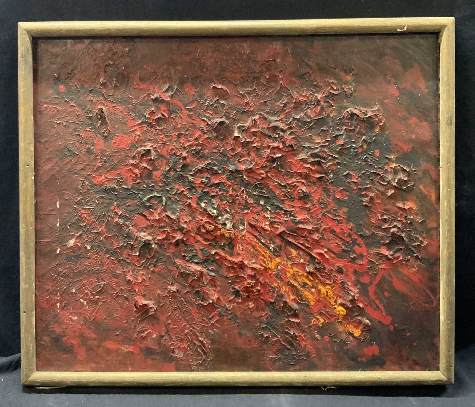 1960 Textured Oil Painting On Canvas: Marked on backside with a prayer, dated 1960. A red and black textured oil painting with raised elements throughout. Framed in a dark wooden frame. Approx 21.5 x 25.5 inches window measures 19.5 x 23.