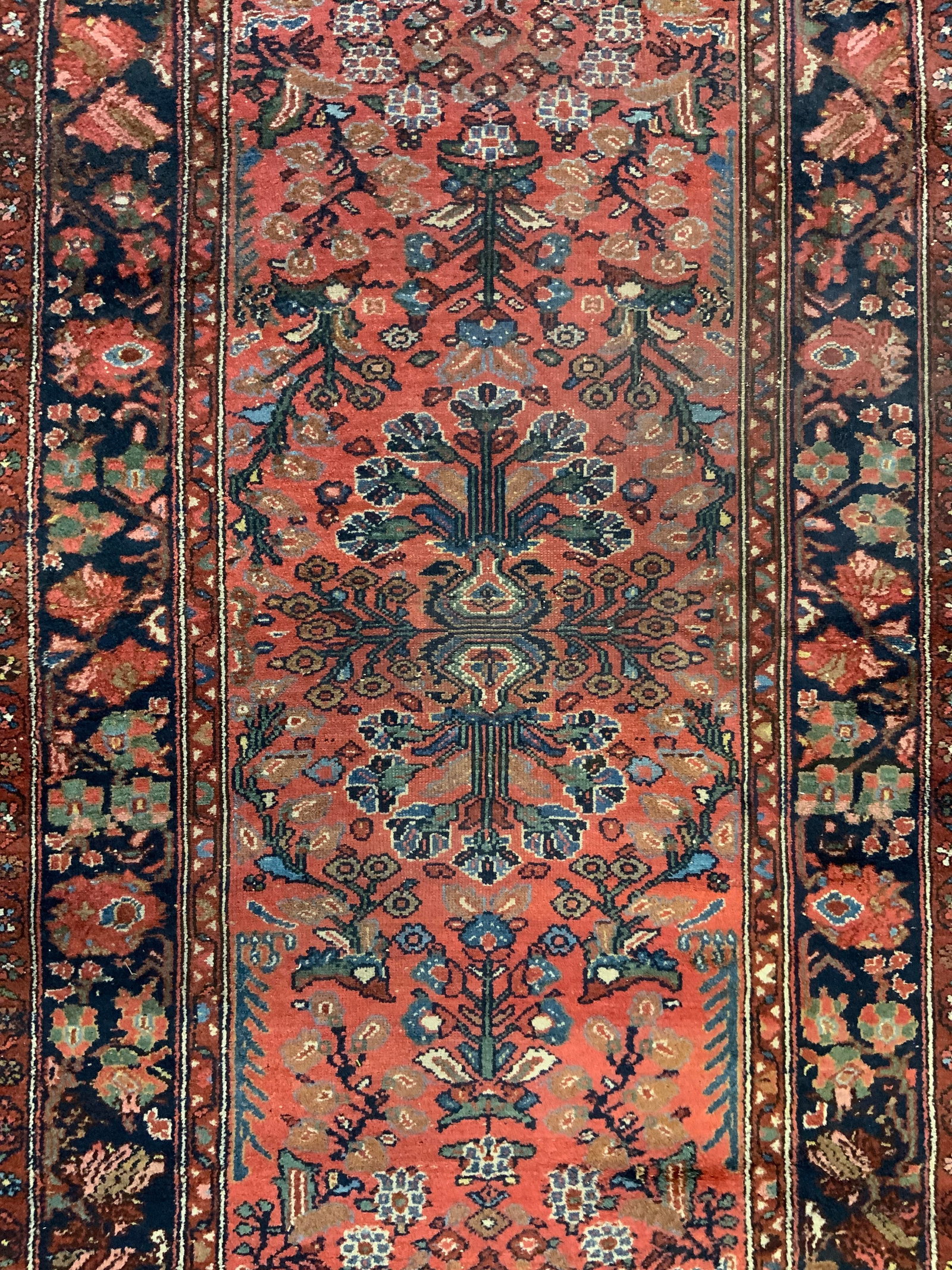 Vintage Handmade Persian Wool Area Rug: Rug is handmade and wool. Piece is vintage. Rug has intricate multi toned floral motif detail. Rug measures approximately 82 inches long 43 inches wide. Persian rug, rug, wool rug, area rug, handmade 