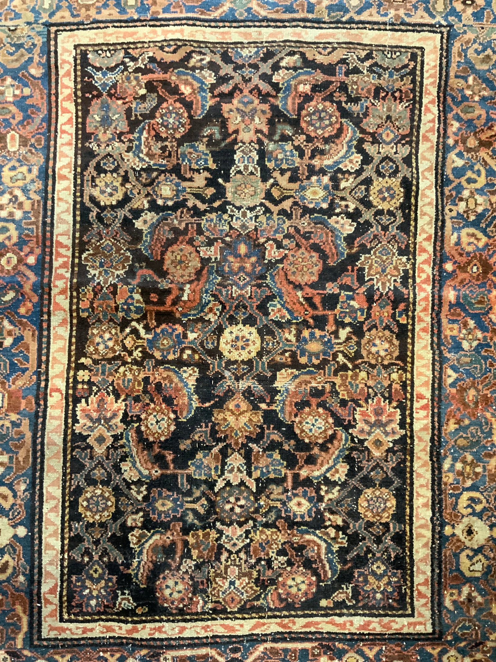 Antique Handmade Persian Wool Area Rug: Rug is handmade and wool. Piece is vintage. Rug has intricate multi toned floral motif detail. Rug measures approximately 55 inches long 40 inches wide. Antique rug, rug, wool rug, area rug, handmade 