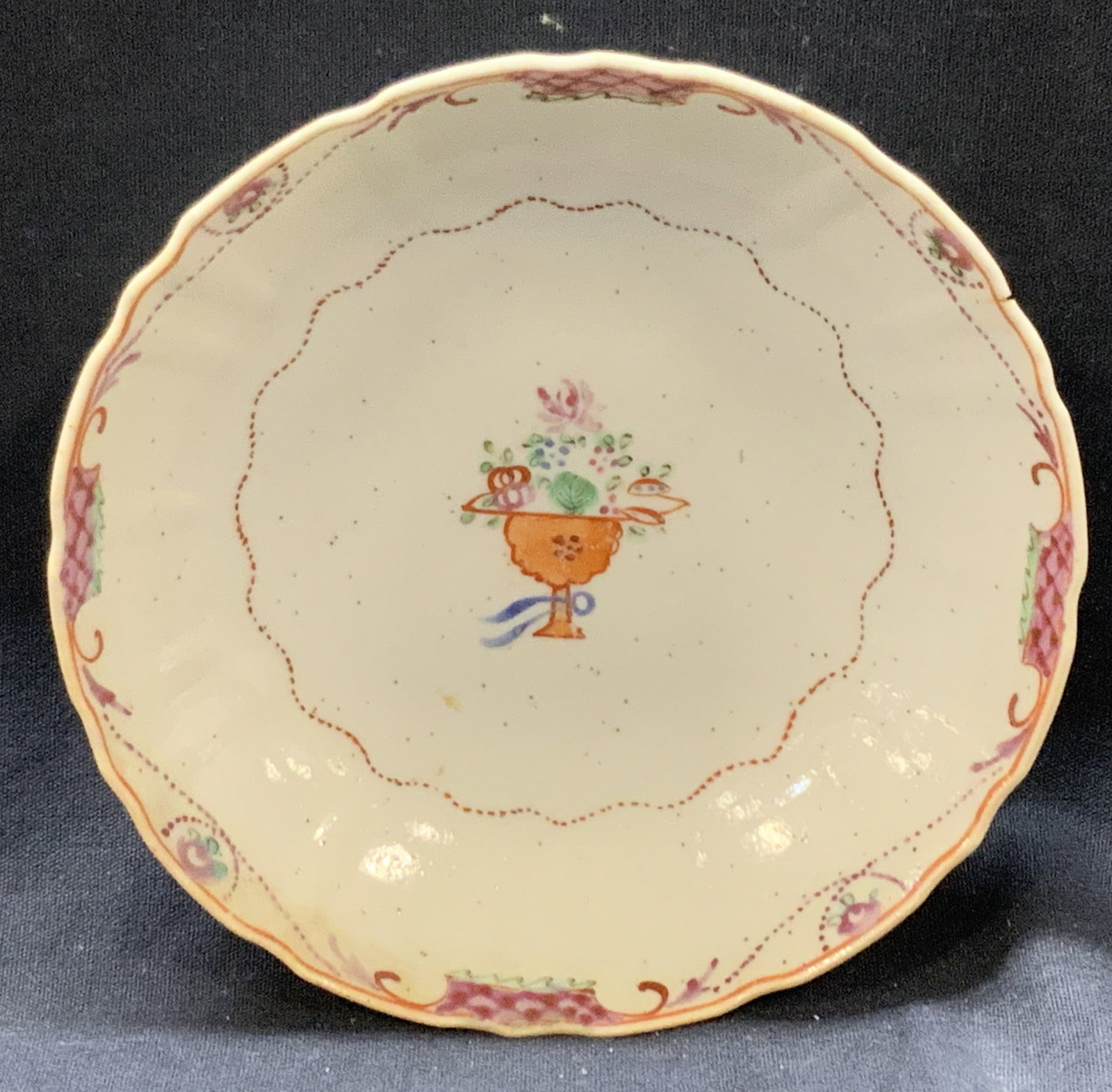 Vtg Hand Painted Floral Ceramic Dish: Vintage ceramic dish with hand painted center bouquet of flowers and magenta patterns on outer edges. Approx 5.75 inch diameter, Evident cracking to edges of dish. Home decor. Vintage ceramic I, ceram