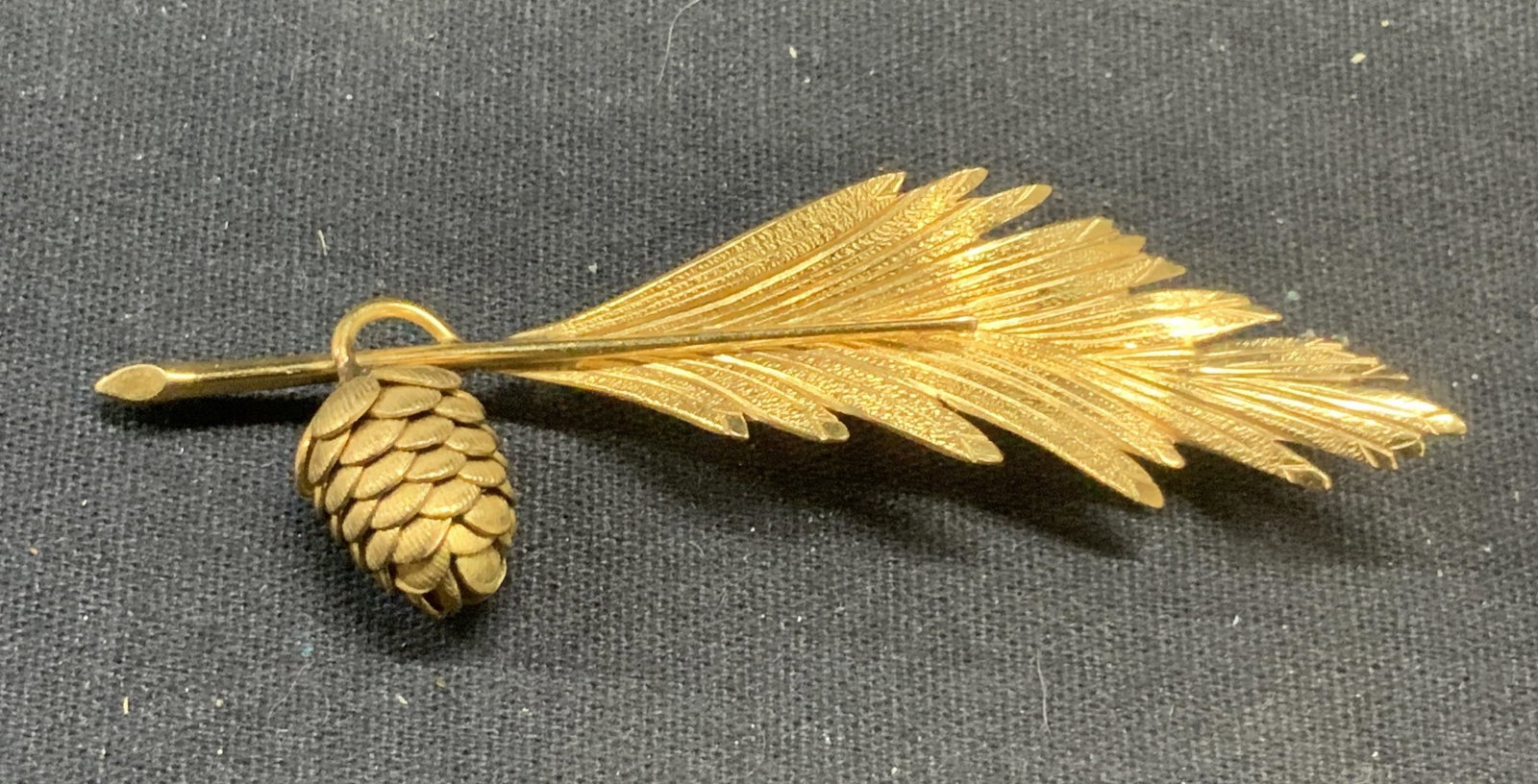 Signed 12k Gold Filled Pinecone Brooch: Signed 12k gold filled pinecone and leaf motif brooch, signed to underside. Marked 12k gf. Measures approx. 3 x 1 inches. Some surface wear including scratching observed. Estate jewelry, costume jewel