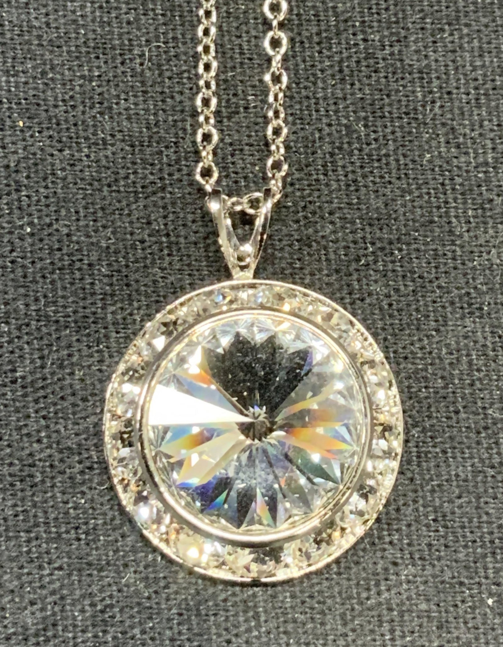Silver Tone Crystal Pendant Necklace: Silver tone crystal pendant necklace. Drop length approx. 10 inches. Pendant measures approx. 7/8 inches wide. Some surface wear including scratching observed. Estate jewelry, costume jewelry, cocktai