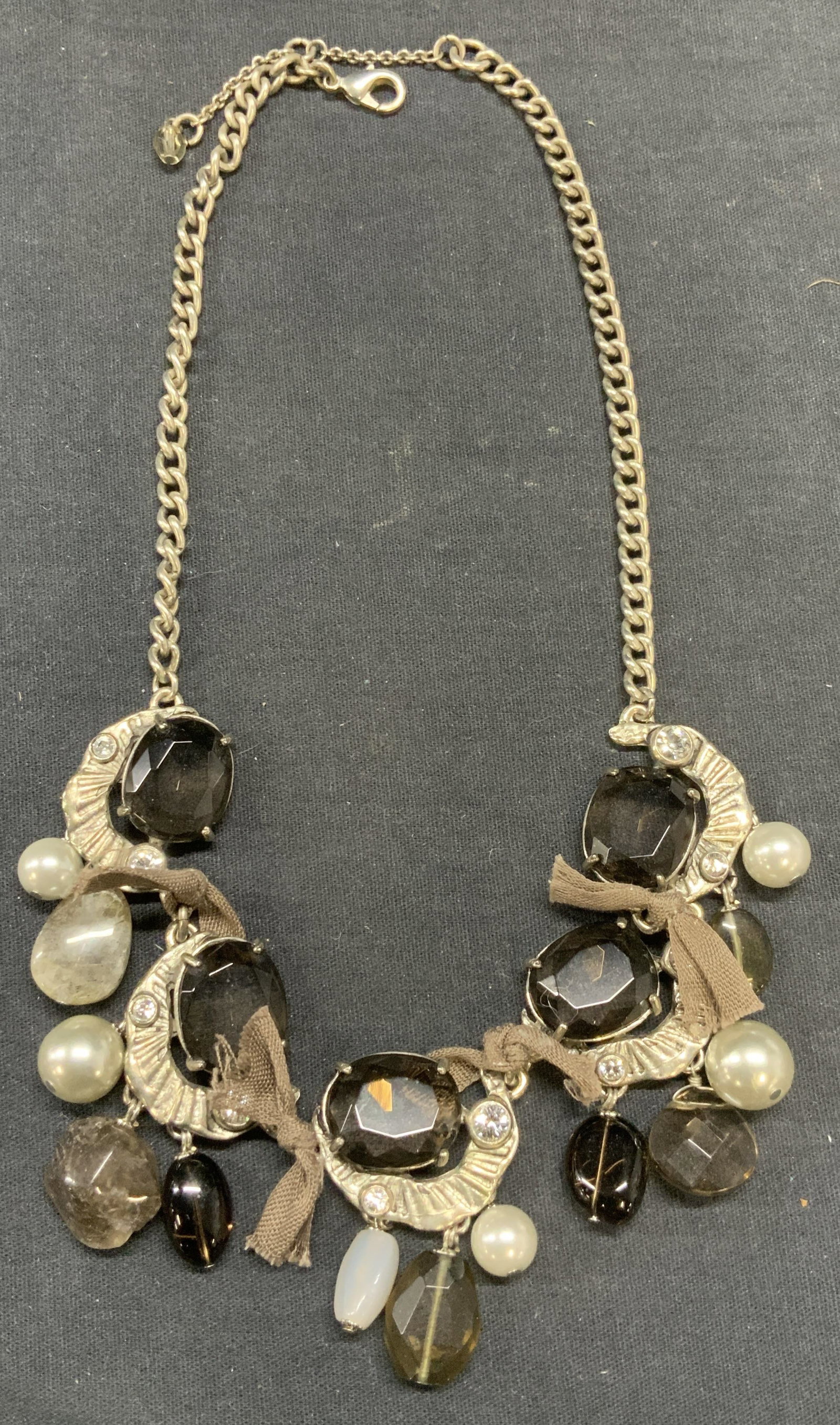 Silver Tone Crystal & Faux Pearl Necklace: Silver tone necklace with crystal and faux Pearl beads. Drop length approx 9 inches. Some surface wear including scratching observed. Estate jewelry, costume jewelry, cocktail jewelry, fashion jewelry