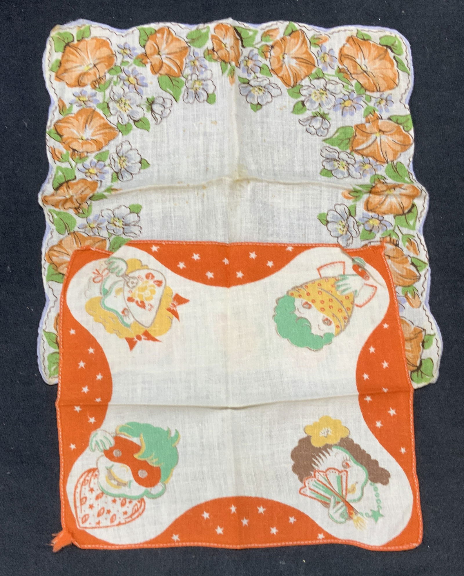 Lot 2 Vintage Floral & Figural Cotton Handkerchief: Lot of 2 vintage cotton handkerchief with floral and Figural motifs. Larger piece measures approx. 9 x 8.5 inches. Both pieces have wear to material including blemishes consistent with exposure. Handk