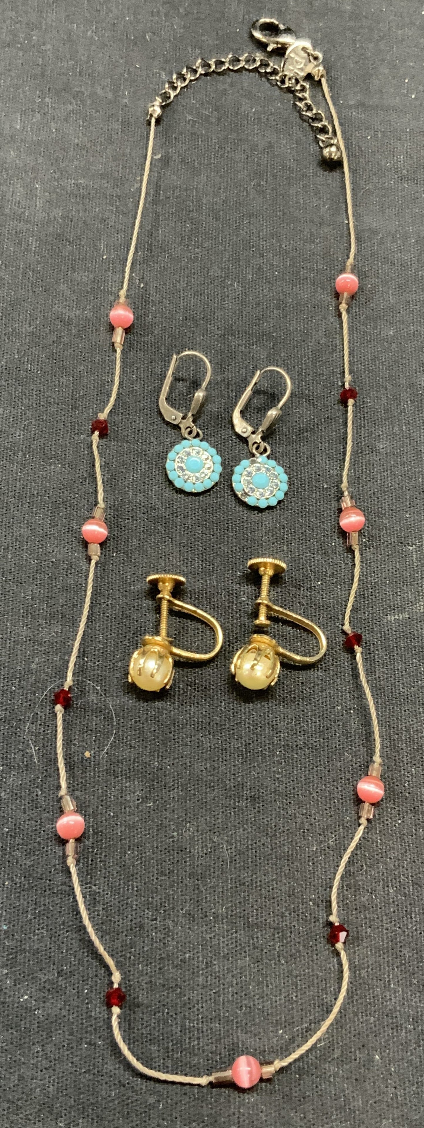 Lot 3 PH Pink Beaded Necklace, More: PH silver tone pink beaded necklace. Signed on hang tag. Drop length approx. 8.25 inches. Gold tone faux Pearl earrings and blue Cabochon and crystal earrings. Larger earrings measure approx. 3/8 inch