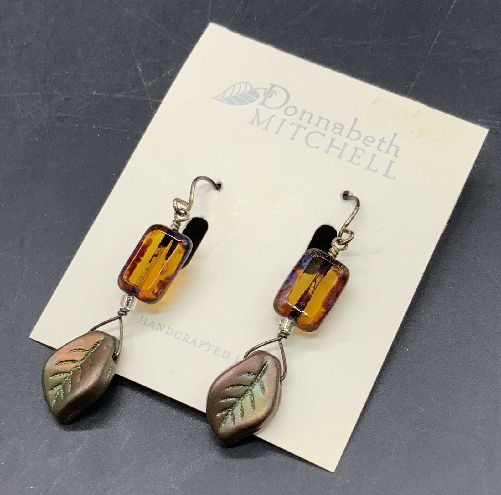 DONNABETH MITCHELL Sterling Silver Earrings, Box: Earrings measure approx. 1.75L x .25W in. Earrings attached to original package which reads DONNABETH MITCHELL, Czech & Japanese Glass Beads, HANDCRAFTED IN USA. Fishhook backings marked 925. Total we