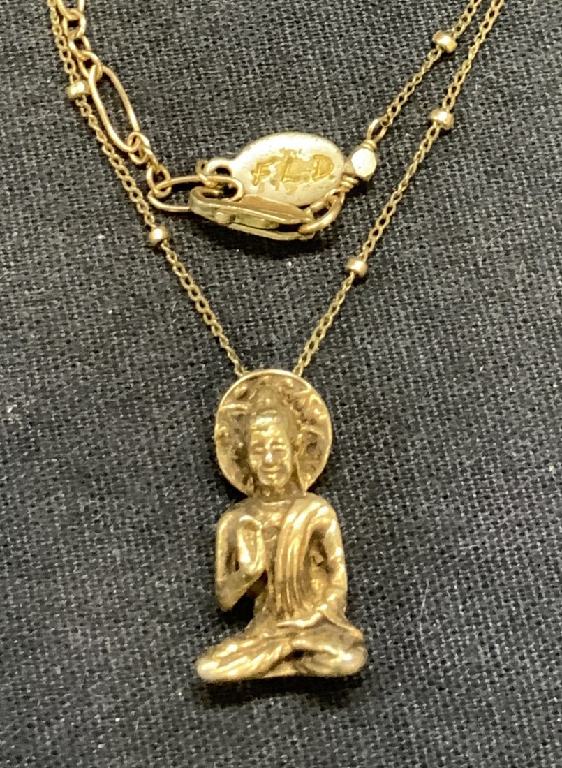 FLD 14k Gold Filled Buddha Pendant Necklace: FLD 14k gold filled necklace with Buddha Figural pendant. Signed on hang tag. Marked 14/20 on clasp. Drop length approx. 9.5 inches. Pendant measures approx. 7/8 inches long. Some surface wear includi