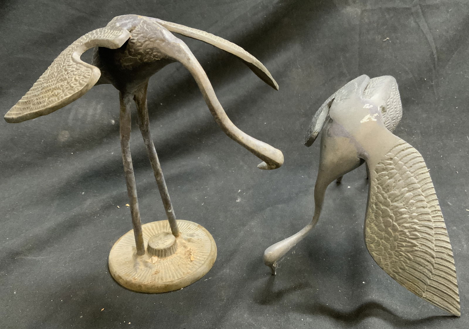 Lot 2 Vintage Pewter Crane Figurals: Lot includes 2 crane figures. Each are slate toned and appear to be pewter possibly white metal. Lot includes 1 crane figure with stand and 1 without stand. Crane figure with stand measures approximat