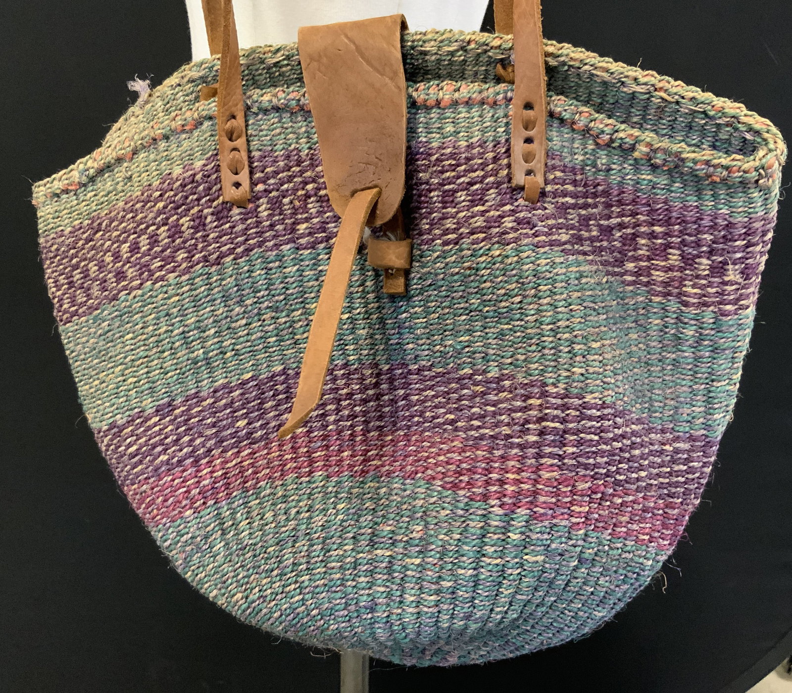 Vntg Woven Sisal Jute & Leather Market Tote: Market tote appears to be vintage. Piece has multi toned woven sisal jute detail. Piece has sienna toned straps which appear to possibly be leather. Measures approximately 13 inches tall (24 inches ta