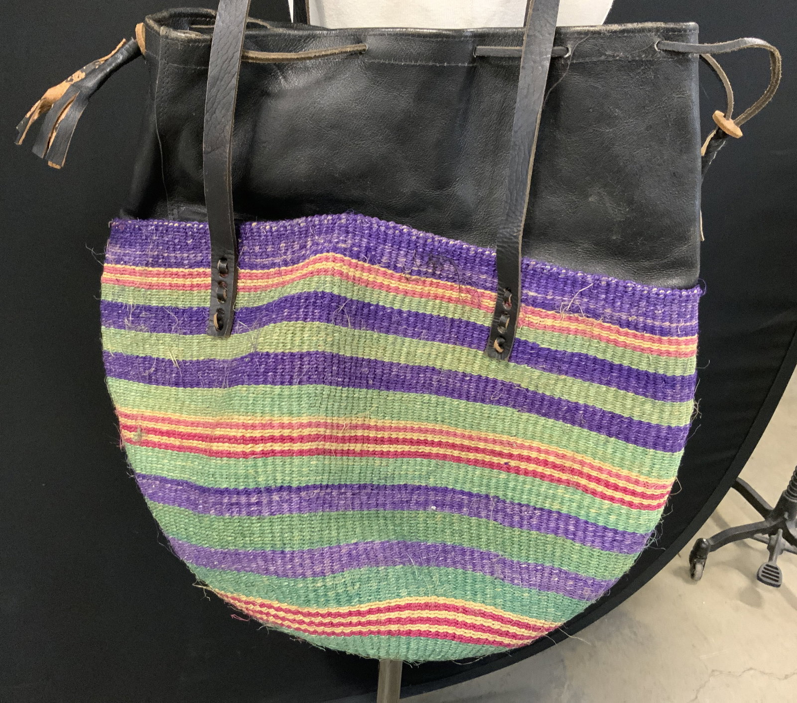 Vntg Woven Sisal Jute & Leather Market Tote: Market tote appears to be vintage. Piece has multi toned woven sisal jute detail. Piece has black toned upper half & straps which appear to possibly be leather. Measures approximately 17 inches tall (
