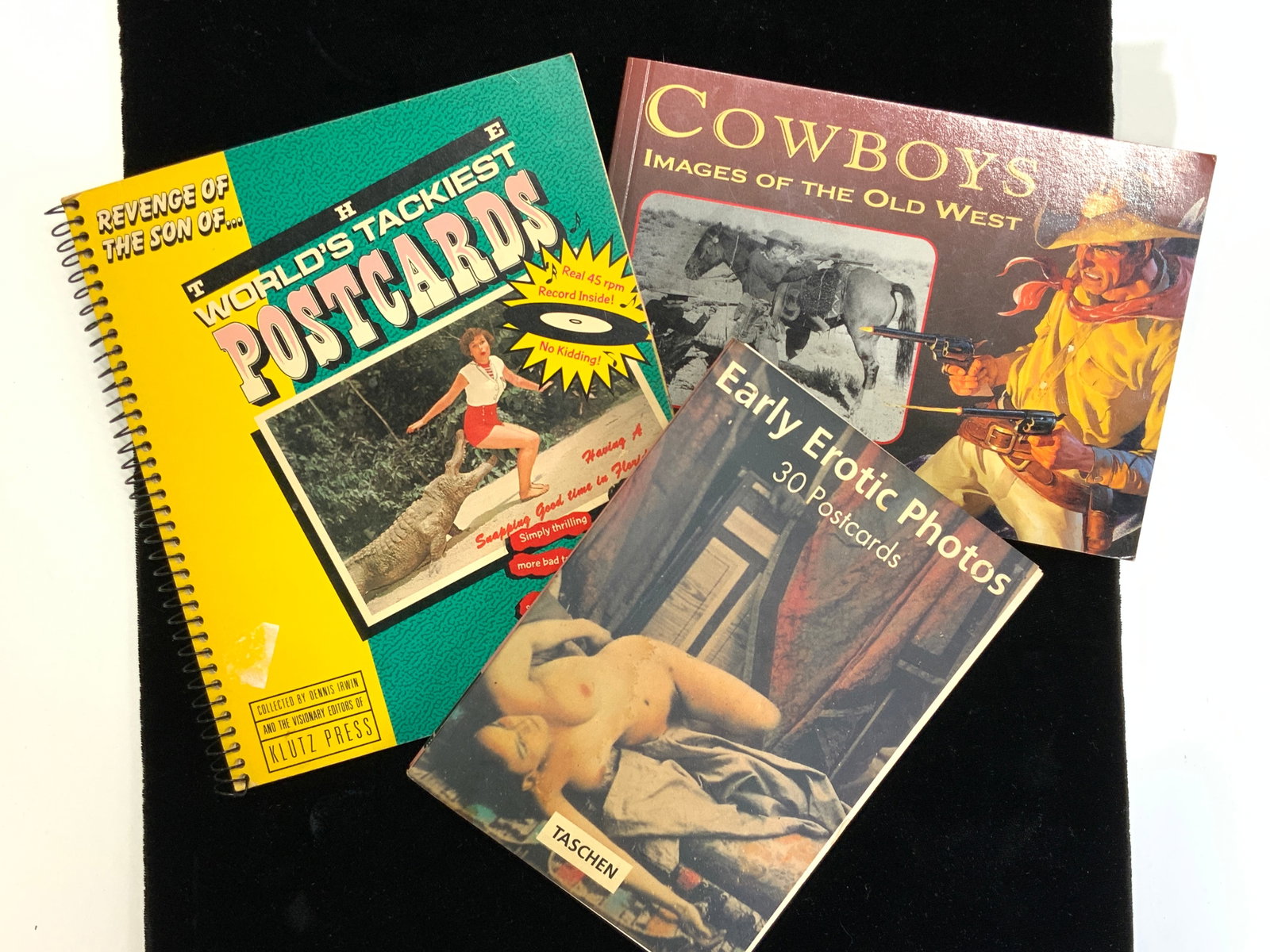 3 Early Erotic Cardboard Postcards & Wild West: Lot of 3 times . Includes booklet of Cowboys and images of the old west postcards, 7 x 4.75 in. Taschens early 20th century erotic photo postcards on cardboard, 6.25 x 4.5 in. Booklet of miscellaneous