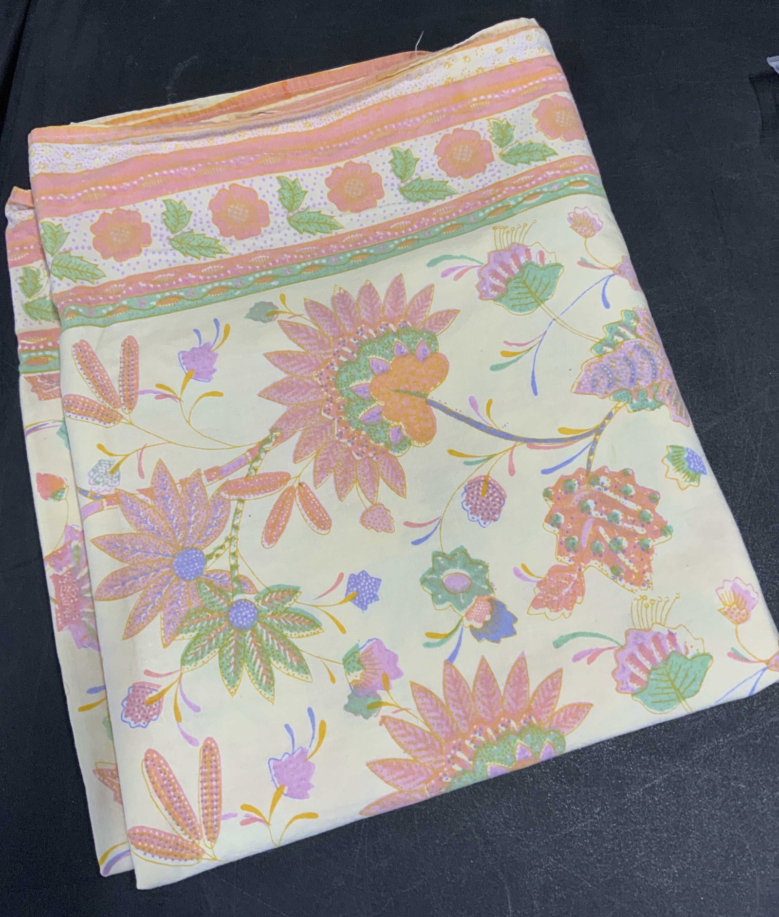 Cotton Rectangular Tablecloth/ Home Accessory: Bright and colorful cotton tablecloth with flowers and leaves. Caribbean colors of mint green, orange and pink on a pastel yellow background. Rectangular, measures 56 in. wide x 109 in. L . Up cycle f