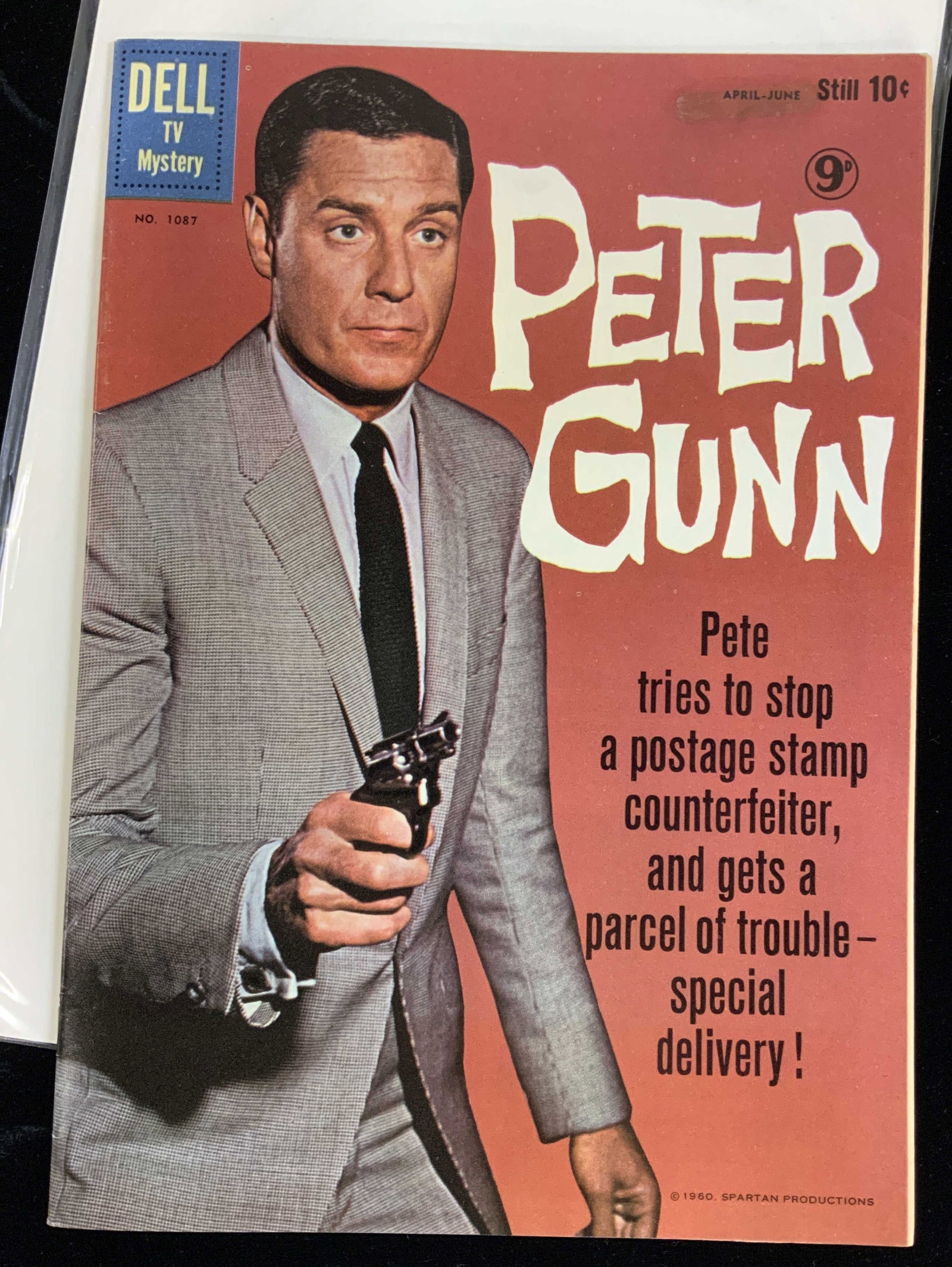 Dell Peter Gun Comic Book # 1087, 1960 Collect.: Collectible vintage comic book by Dell Comics , April- June 1960, issue # 1087. Peter Gunn- The Harmless Hobby & The Purple Clue10.25 x 6 1/8 in. Maintained in plastic sleeve. Peter Gunn The Harmless 