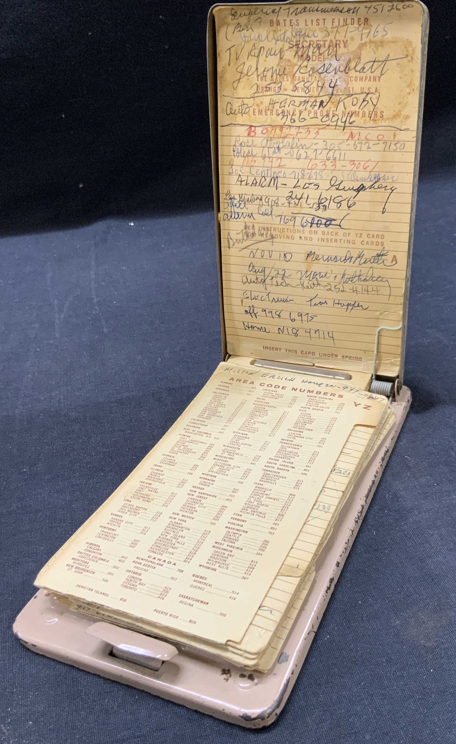 Vntg Bates List Finder Metal Accessory: Vintage metal made bates list finder with pink undertone and gray metal cap with spring hinge. Approx 7.5 x 4 inches Evident discoloration and wearing to metal throughout Vintage bates list finger, li