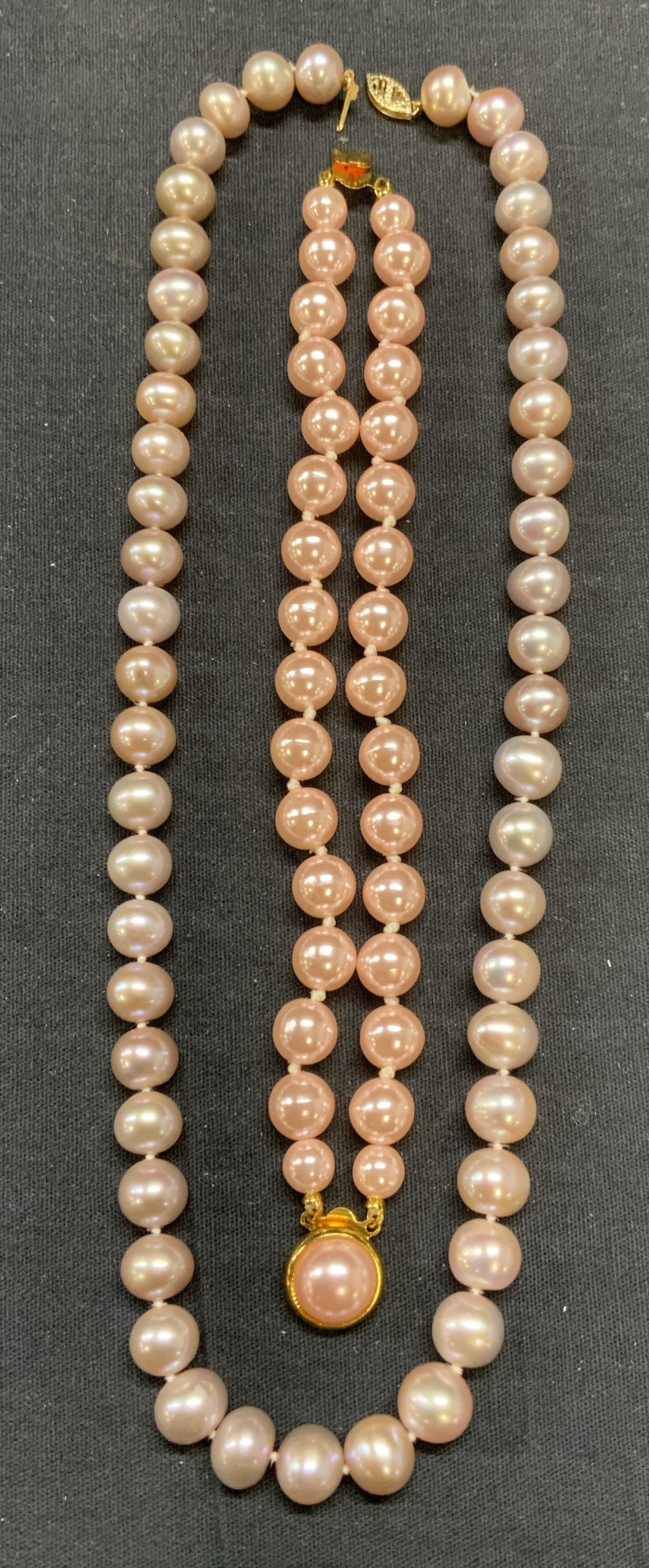 Lot 2 Pink Pearl Beaded Necklace, More: Lot of 2 jewelry pieces. Pink pearl beaded necklace on double knotted string. Drop length approx. 9.5 inches. Total weight 334 carats. Clasp needs repair. Pink faux pearl double strand beaded bracelet