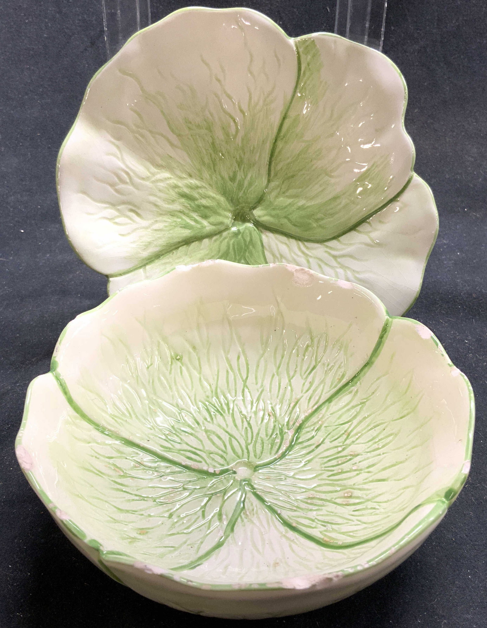 OGG Set 2 Porcelain Lily Pad Bowl & Saucer ITALY: Underside reads OGG ITALY. Lot includes 1 bowl and 1 saucer. Each piece is green and white toned with Lily pad form. Each piece in set is porcelain. Saucer measures approximately 5.5 inches wide. Lily