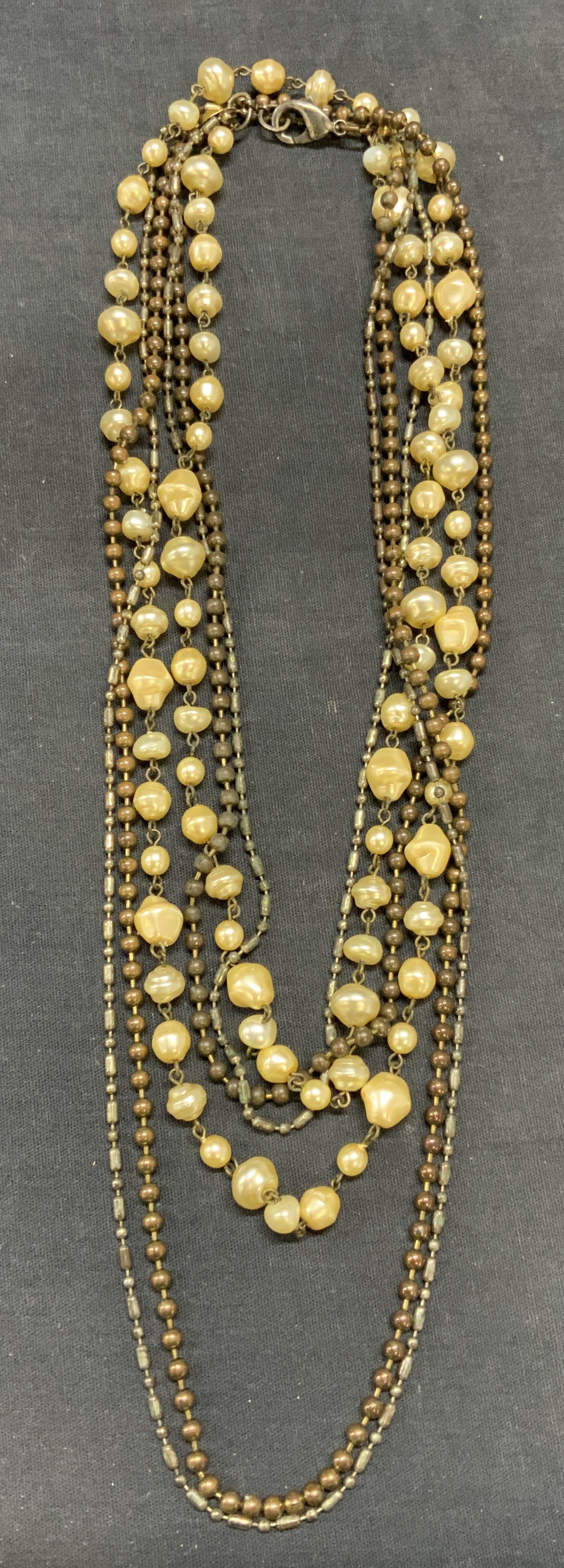 Vintage Faux Pearl Beaded Necklace: Vintage faux pearl beaded multi strand necklace. Drop length approx. 22 inches. Some surface wear including scratching observed. Estate jewelry, costume jewelry, cocktail jewelry, fashion jewelry, acc
