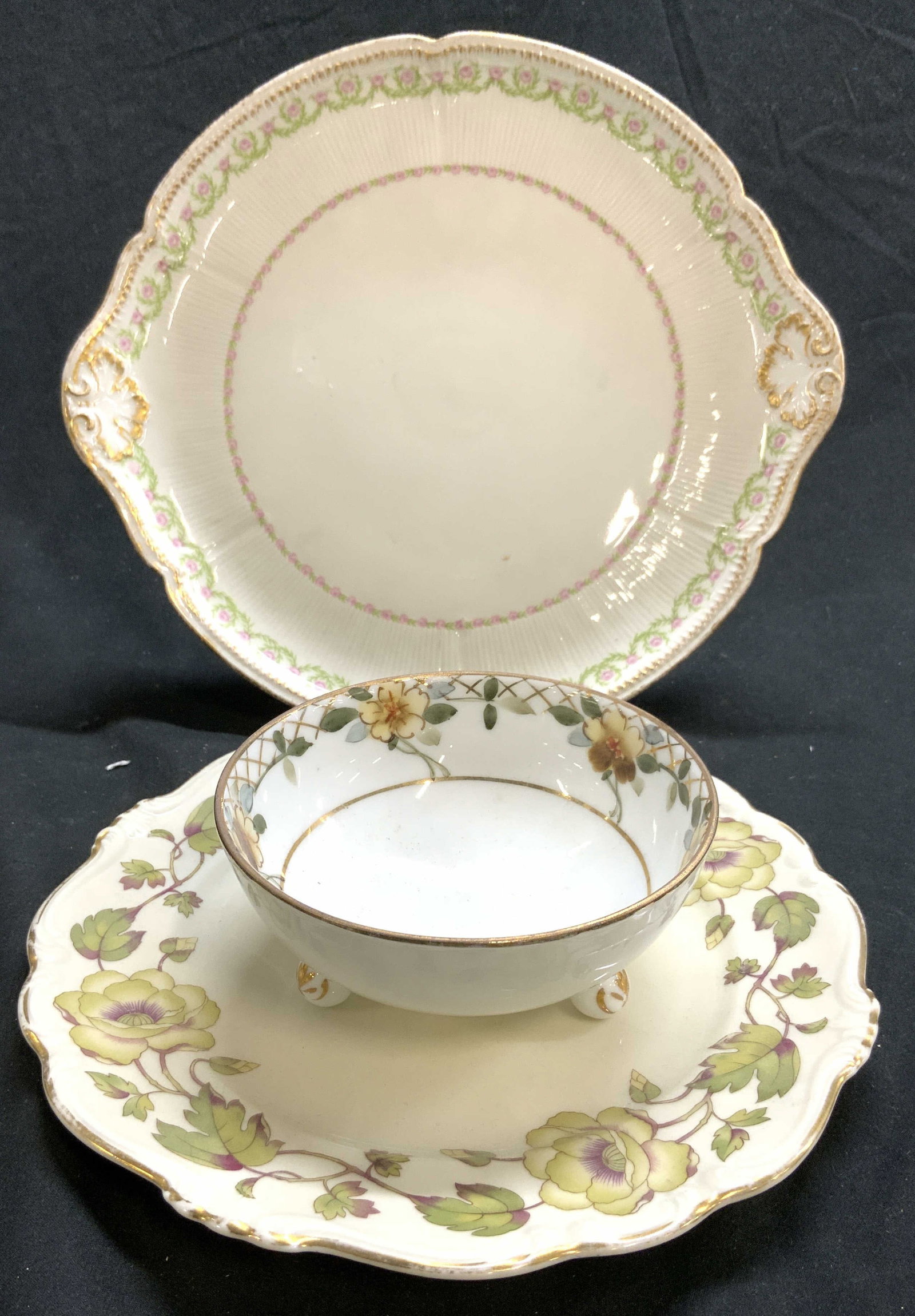 Lot 3 Vntg Trademarked Porcelain NIPPON & More: Lot Includes 1 porcelain bowl with 3 feet and floral detail marked NIPPON on underside, 1 plate with pink and green floral, leaf, & gilt detail marked CH FIELD HAVILAND on underside, & 1 ROSENTHAL BAC