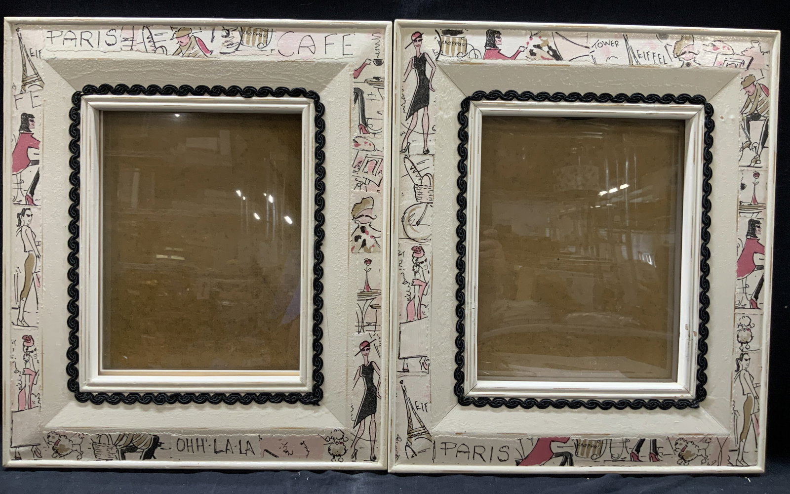 Set 2 Collage Paper Wooden Frames: Set of 2 white painted and collaged frames with glass. Collages with papers of French fashion. Poodles and Eiffel tower motifs approx 16 x 14 inches window measures 10 x 7 inches Moderate wearing to f