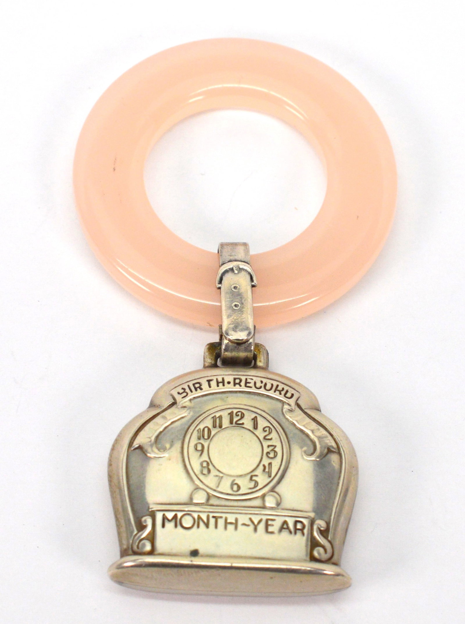 Antique Sterling Silver Baby Rattle W Teething Ring: Antique Sterling Silver Baby Rattle with Pink Teething Ring Ring is 1.5in in diameter. Sterling charm is approximately 2in long and 1.25in wide. NB BS13