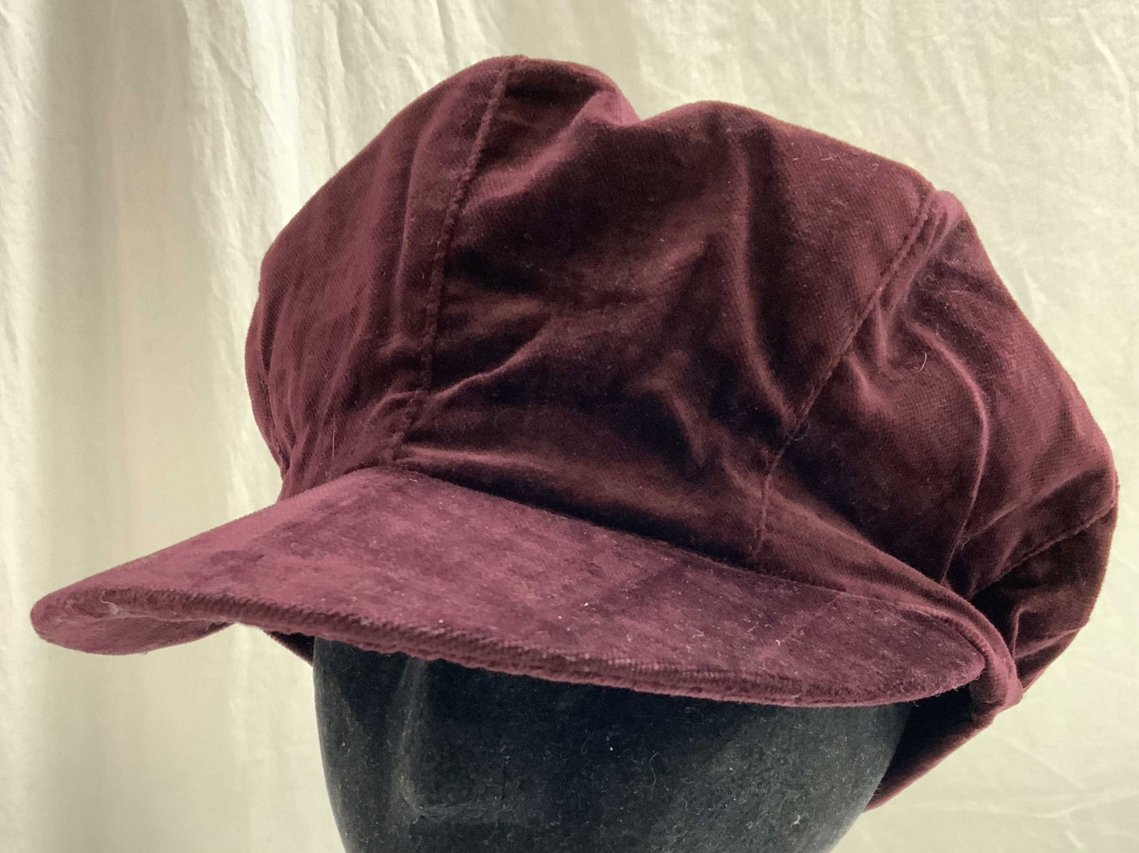 JOHNATHAN RICHARD Cotton Brimmed Beret M IRELAND: Tag on interior reads JONATHAN RICHARD MADE IN IRELAND. Hat is cotton as reads on tag size Medium. Beret has brim and has dark maroon tone. Hat measures approximately 10 inches deep 5 inches tall 8 in