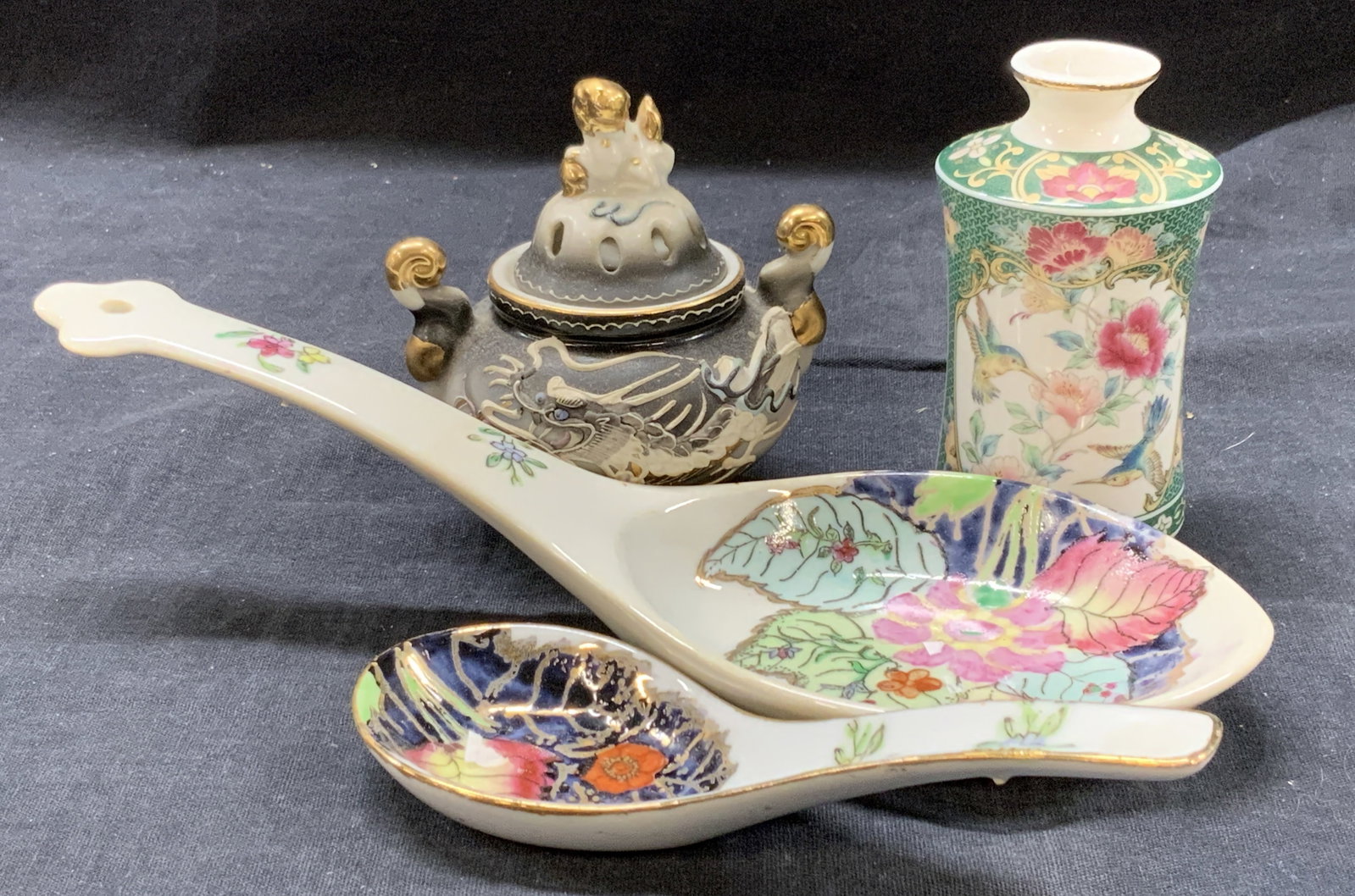 Lot 4 Hand Painted Porcelain Wares, Japan: Lot of 4 porcelain accessories. 1 lidded hand painted censer with a painted motif of a dragon on the side and a fu dog on the lid. 2 hand painted soup spoons, both marked hand painted in Japan and bot