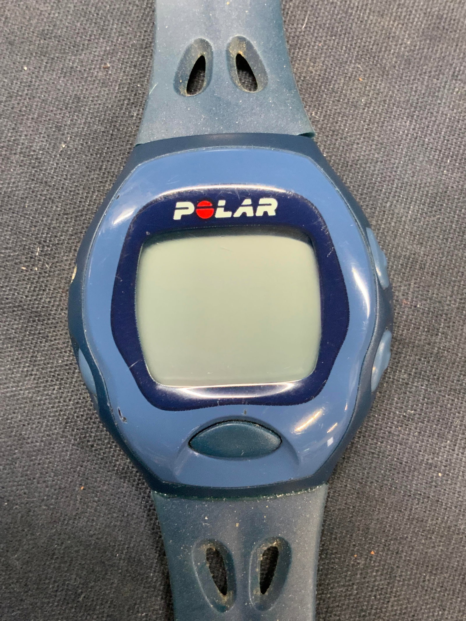 Polar Water Resistant Sport Watch: Rubber wrist banded watch marked Polar, water resistant on backside. Approx 9 inches long with watch face being 1.5 inches wide. Moderate wearing to materials due to age and use. Not tested for functi