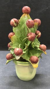 Hand Painted Italian Ceramic & Metal Topiary: Made in Italy is this fruit topiary sculpture. Hand painted. Stamped hand painted and Made in Italy. Ceramic vase with metal leaves and fruit. Measures 10.25 in tall x 6.5 in. Wide. One metal