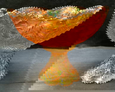 Orange Carnival Glass Footed Centerpiece Bowl,2: Vintage saw- tooth edge carnival glass footed bowl. In 2 pieces- stand and bowl. Impressed and embossed floral detail. Vibrant iridescent orange. Some surface scratching consistent with use and