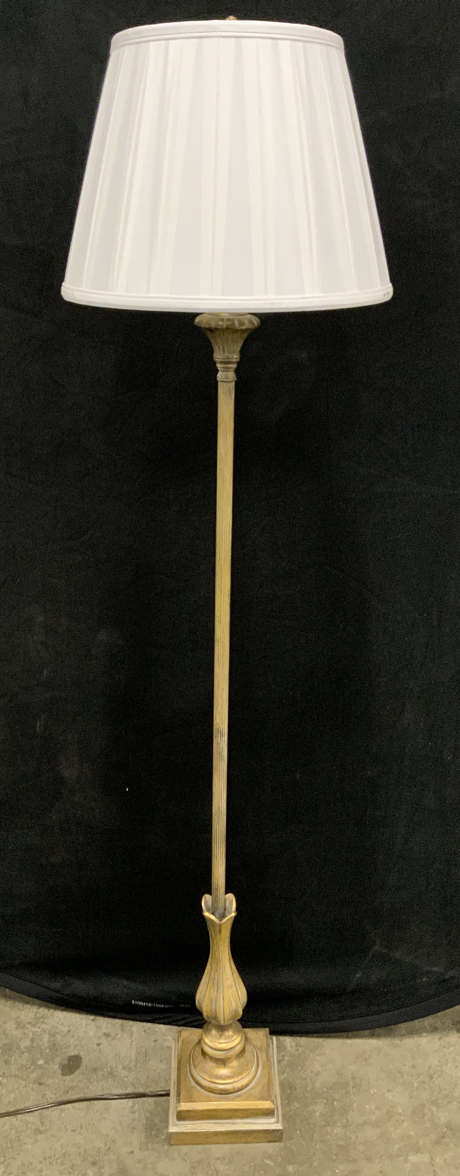 Vintage Gilt Metal Floor Lamp W Silk Shade: Lamp is vintage. Piece appears to be gilt metal, possibly brass. Lamp has white toned silk shade & artichoke form finial. Lamp base has square shape. Upper half of base has vase form. Lamp measures ap