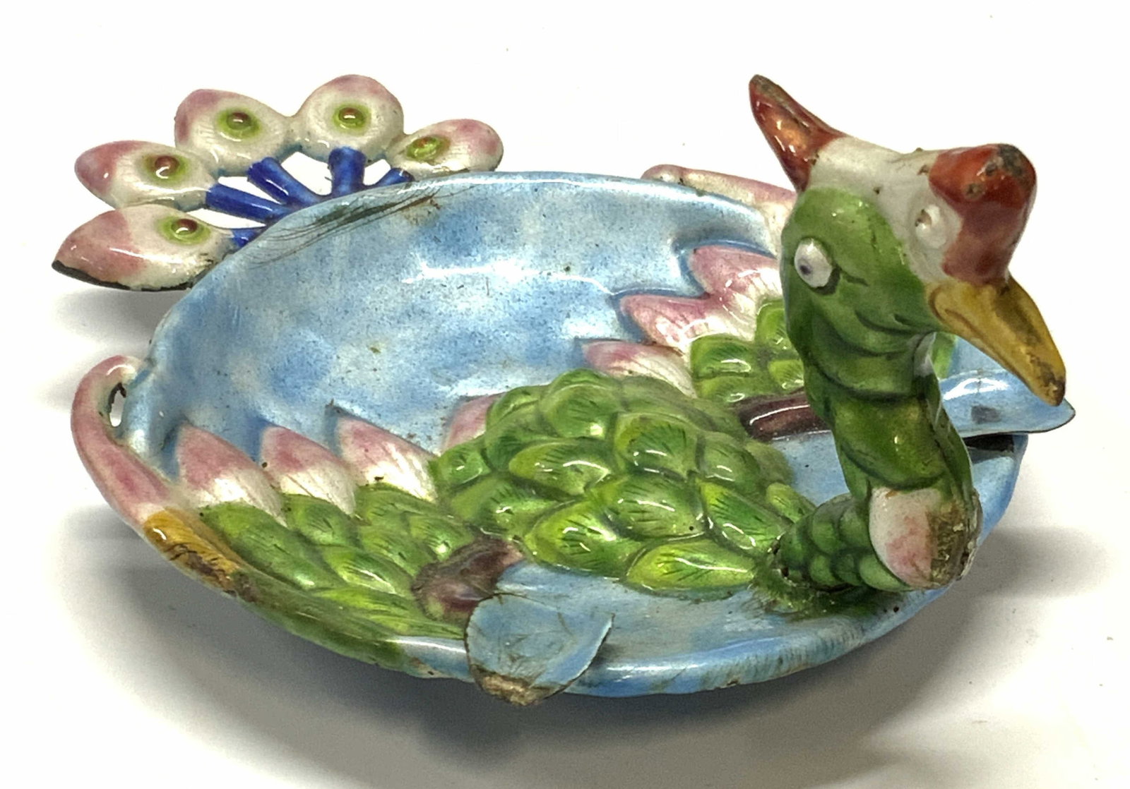 Vntg Asian Enamelware Peacock Figural Trinket Dish: A vintage Asian enamelware peacock figural trinket dish / ashtray. Vibrant multicolored enamelwork throughout the metal. Embossed metalwork design. Measures approx. 2.75H x 6W in. Measured at widest p