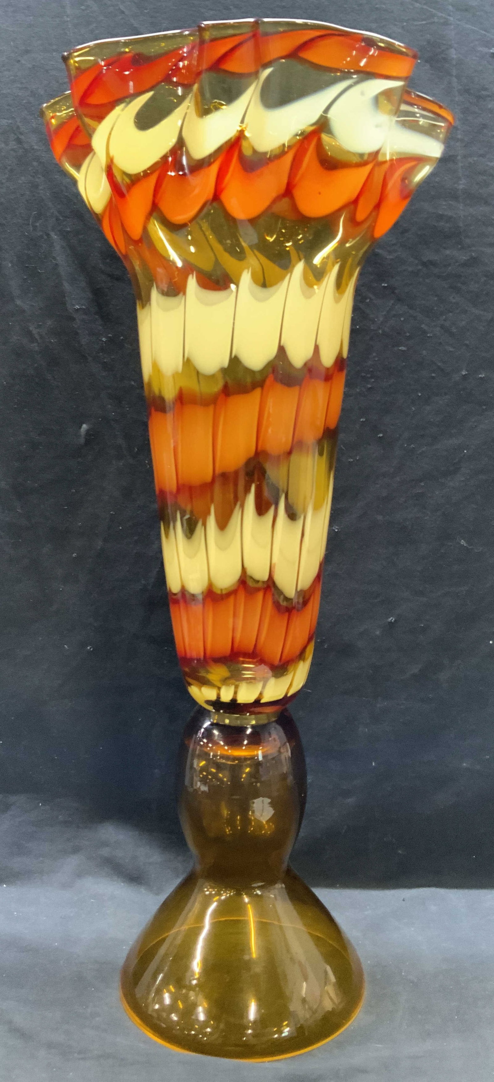 JOZEFINA ATELIER Art Glass Harmony Vase Poland30in: A JOZEFINA ATELIER art glass Harmony vase. Sticker to obverse reads KROSNO, JOZEFINA, HANDMADE IN POLAND. Amber, orange, and white hues are swirled together. Ruffled rim. Measures approx. 30H x 13W in
