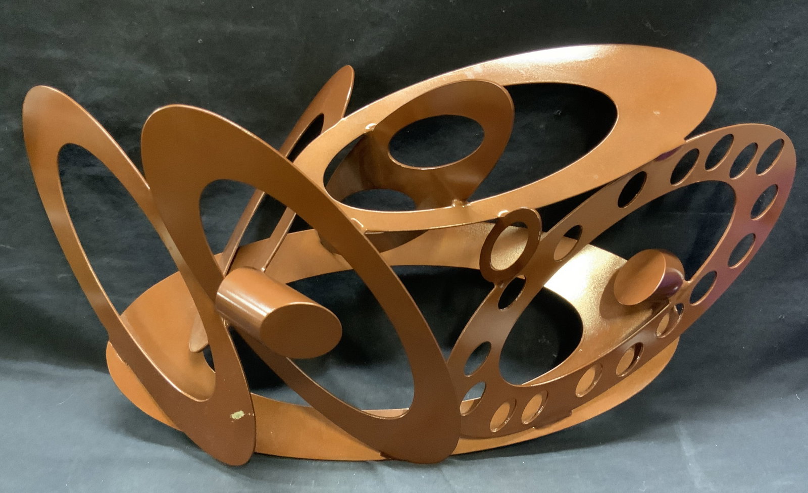 CHERYL FARBER SMITH Maquette Brown Steel Sculpture: Reverse is signed CFS. Sculpture is brown toned and crafted from steel. Piece finished in brown toned car paint. Piece has various ellipse form structures, one with pierced ellipse pattern. Reverse ha