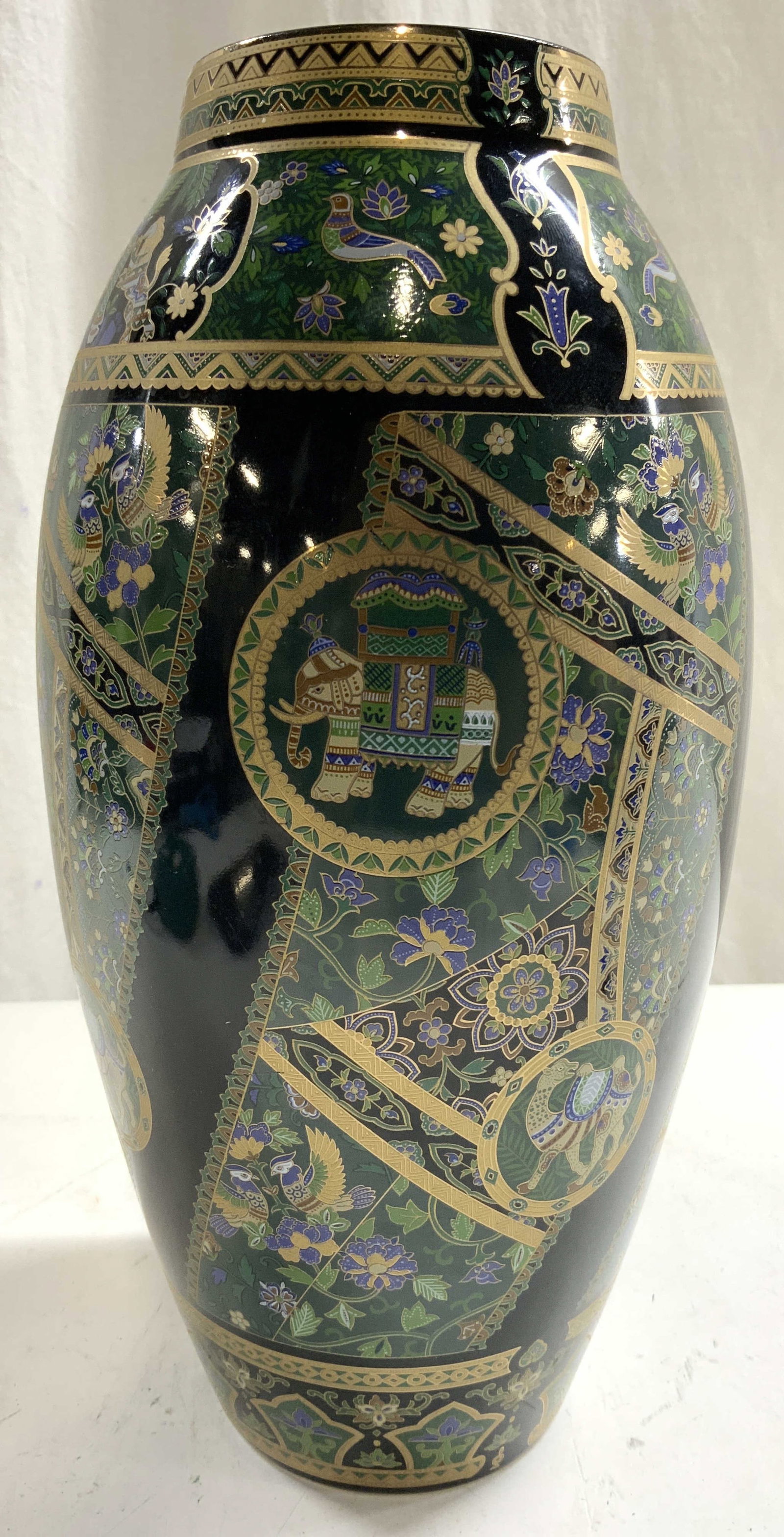 YAMAJI Asian Porcelain Vase Vessel JAPAN: Underside is marked YAMAJI JAPAN. Vase is black toned and porcelain with intricate multi toned bird, floral, leaf, elephant & camel detail. Vase measures approximately 11 inches tall 5.25 inches wide.