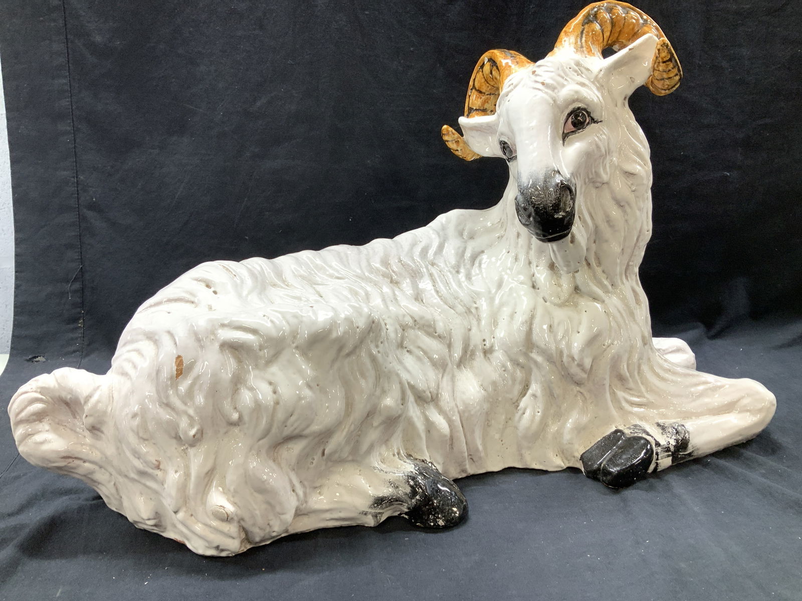 Italian Terracotta Floor Sculpture, 31 in. L, Ita: Luxury vintage hand crafted terra cotta ram sculpture. Reads Italy in underside. Heavy piece. Measures 31 in. L x 19.5 in. Tall x 13 in. Wide. For Floor or large table. Hand painted and glazed. A few