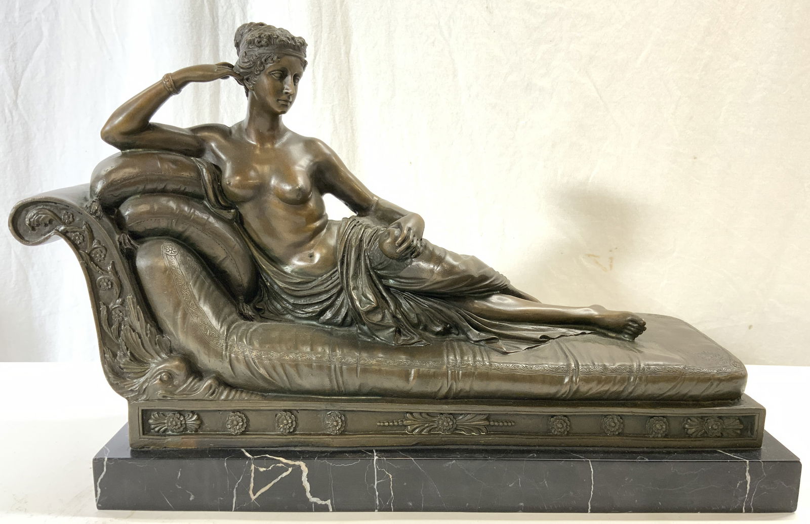 ANTONIO CANOVA PAULINE BONAPARTE Sgnd Brnz Fem Nude: Backside is signed A CANOVA. Piece is bronze. Sculpture depicts female nude laying on chaise PAULINE BONAPARTE AS VENUS VITRIX. Bronze piece is affixed to black toned marble base. Piece is significant