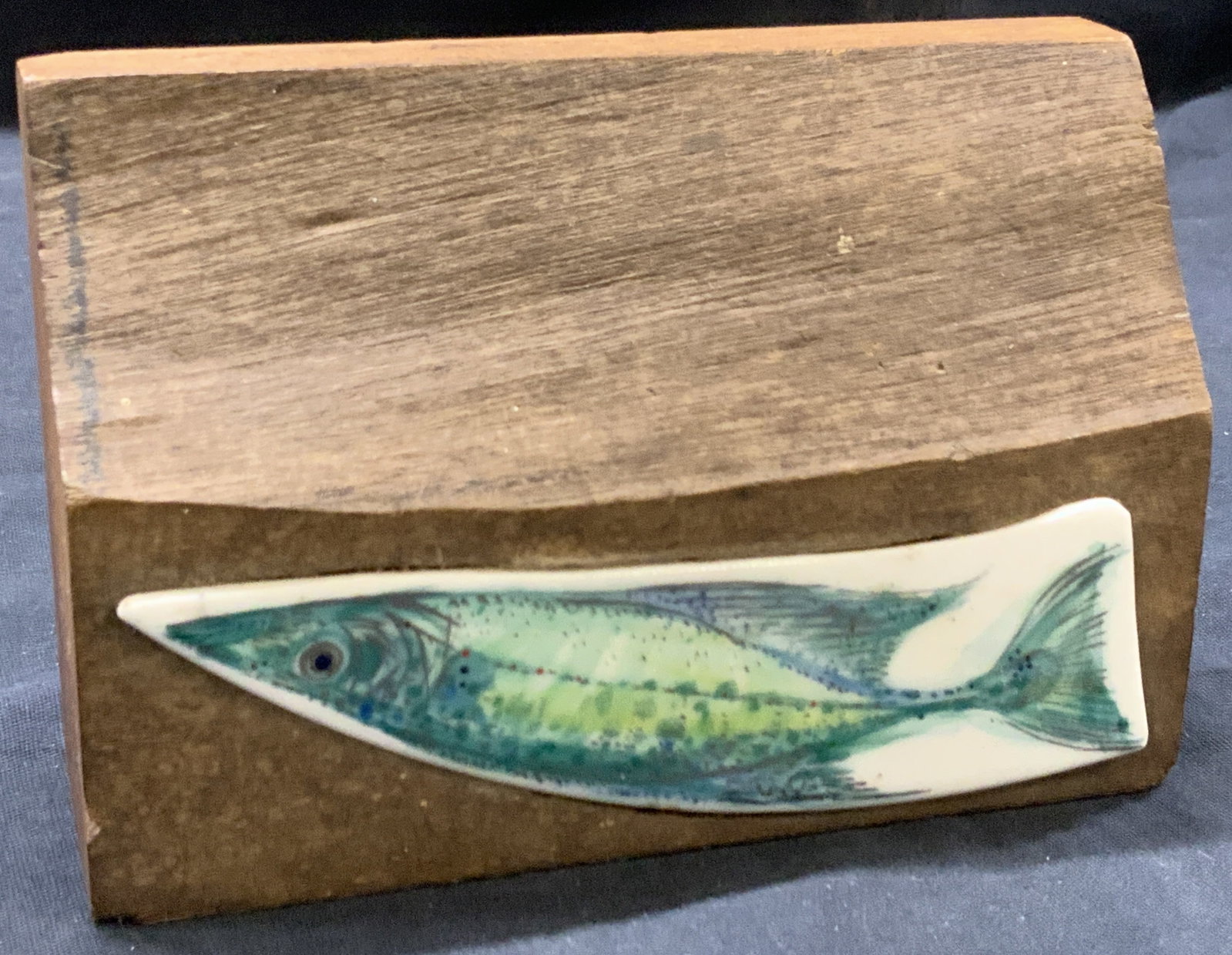 Hand Painted Porcelain Fish On Wood: Wooden box with a hand painted image of blue toned fish painted on porcelain. Approx,4 x 6 x 4 inches. Moderate wearing to wooden block and porcelain. Home decor. Fish decor, fish accessories, hand pa